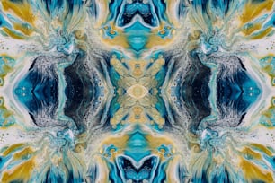 an abstract image of a blue and yellow flower