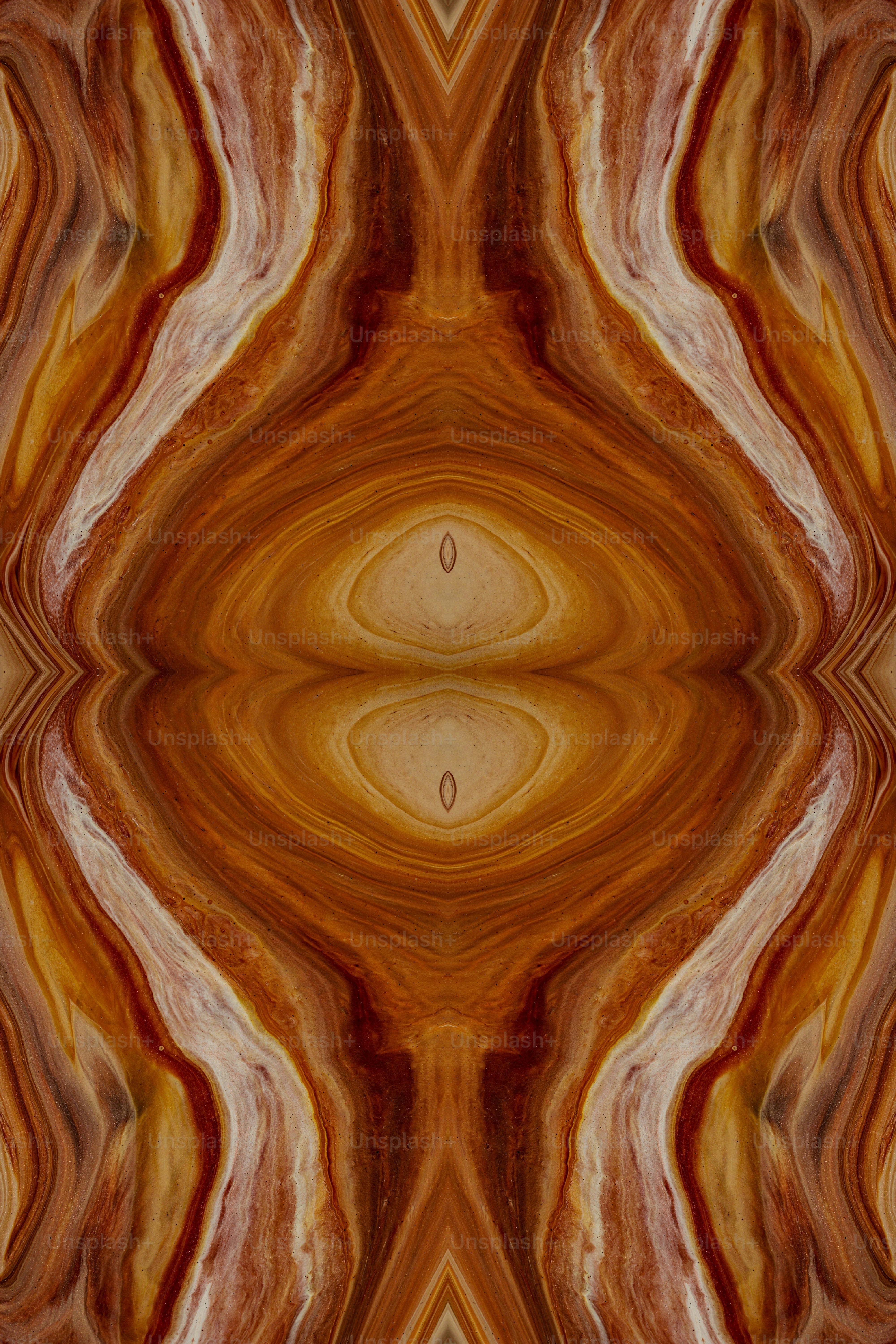 An abstract image of an orange and brown pattern photo Pattern Image on Unsplash