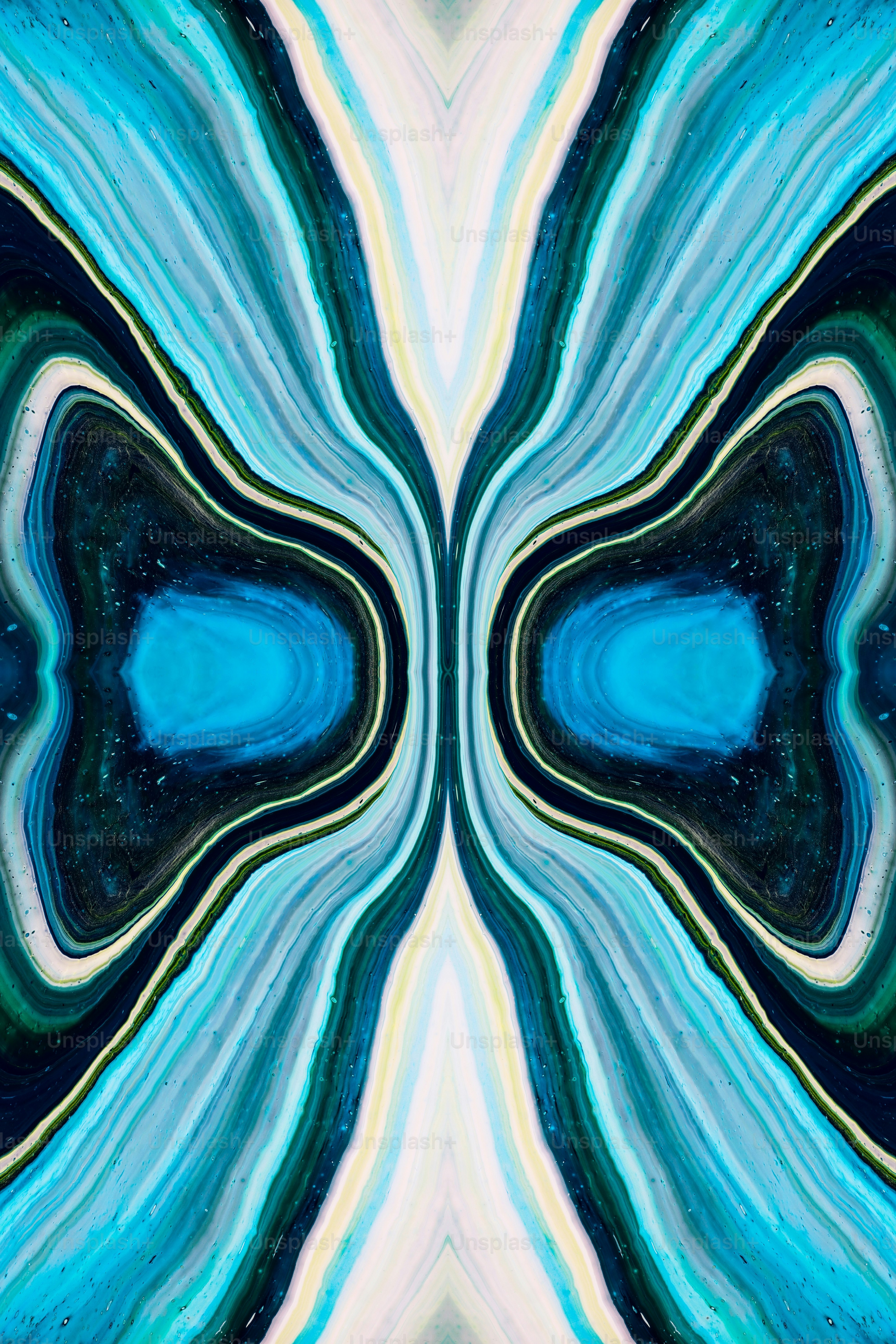 Un'immagine astratta di forme blu e verdi