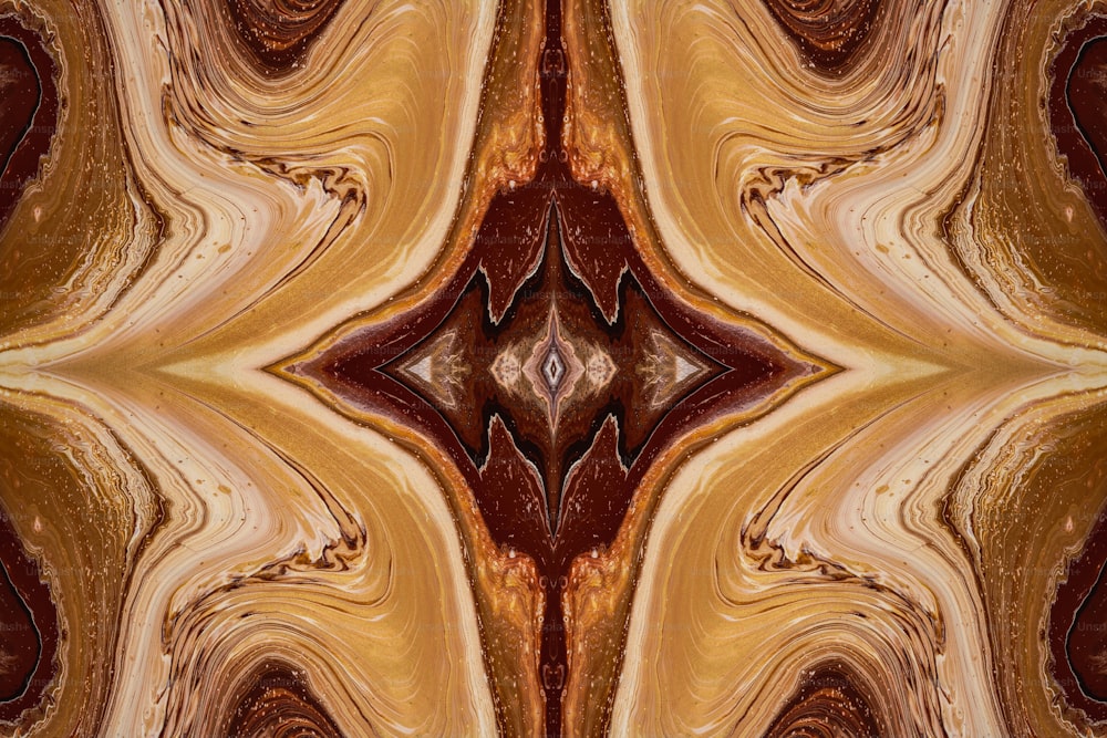 Una imagen abstracta de un patrón dorado y marrón