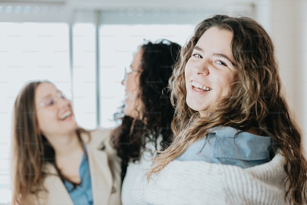 a group of women standing next to each other