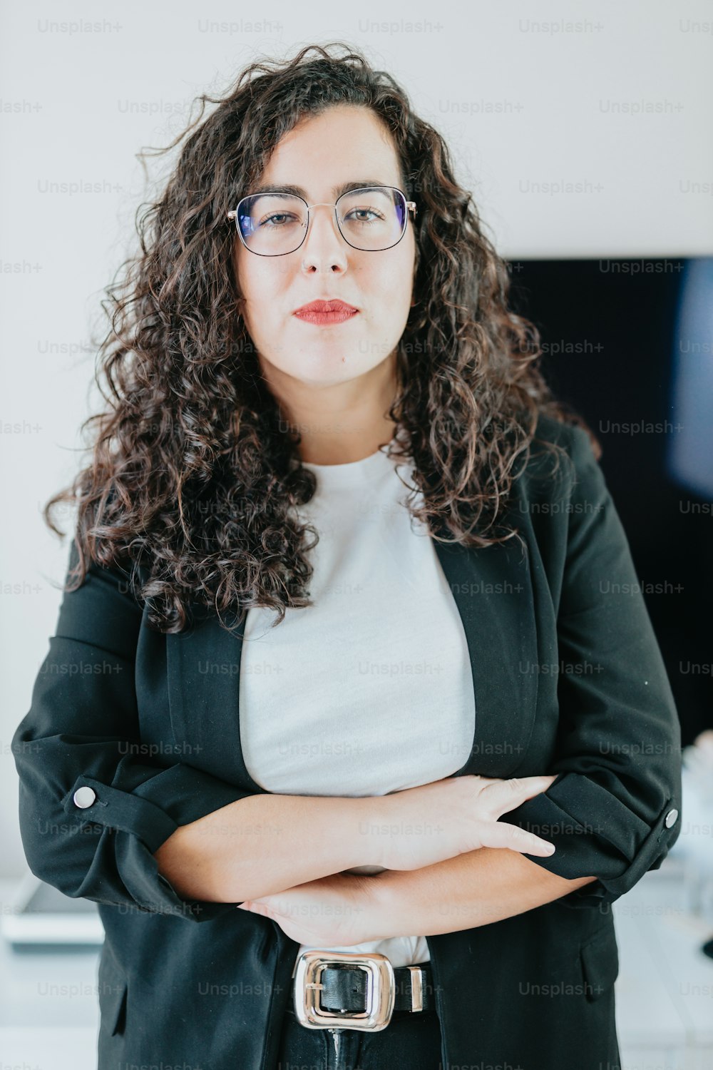 Premium Photo  A woman wearing glasses and a suit