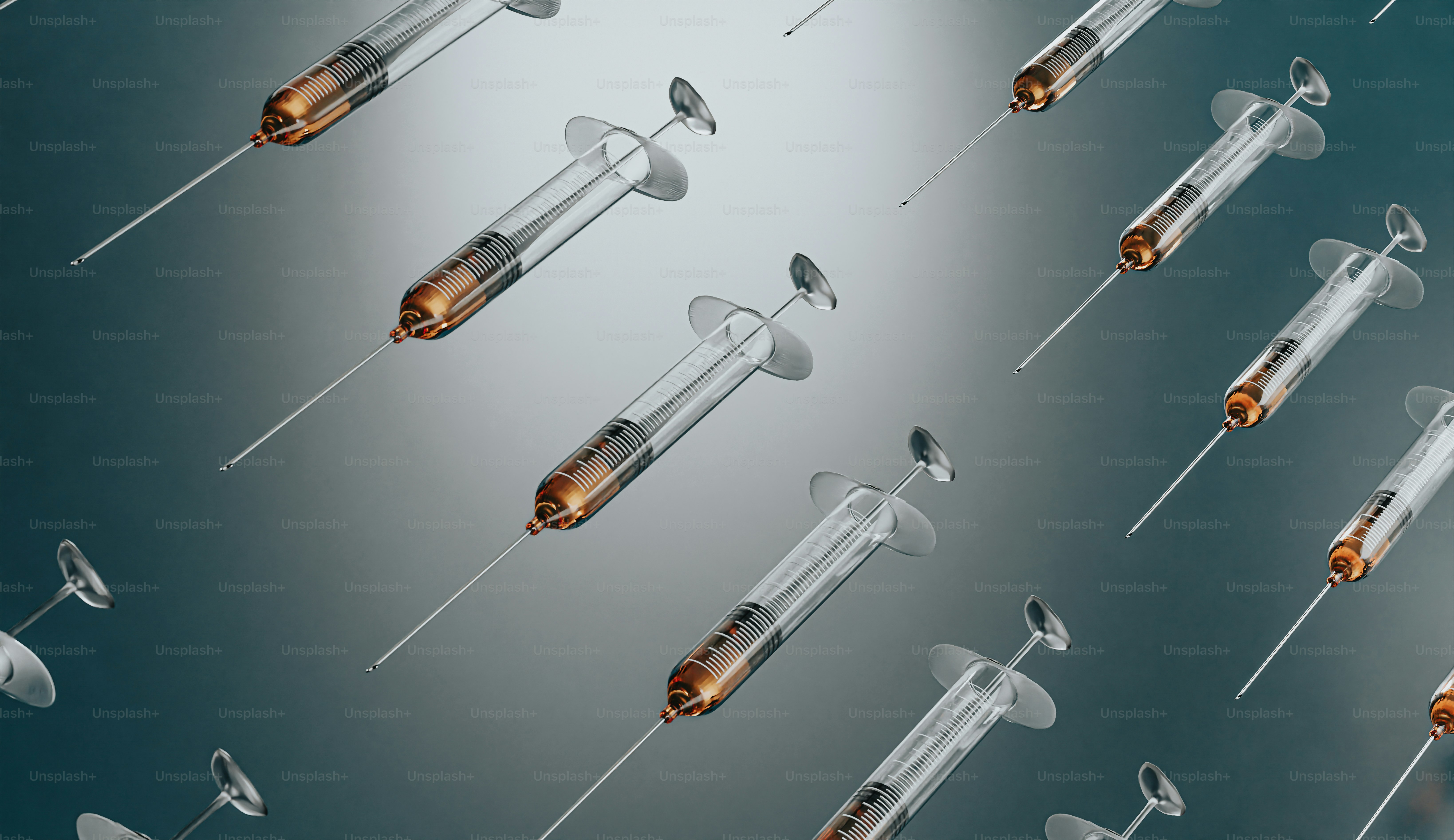 A group of medical instruments with a liquid inside of them photo ...