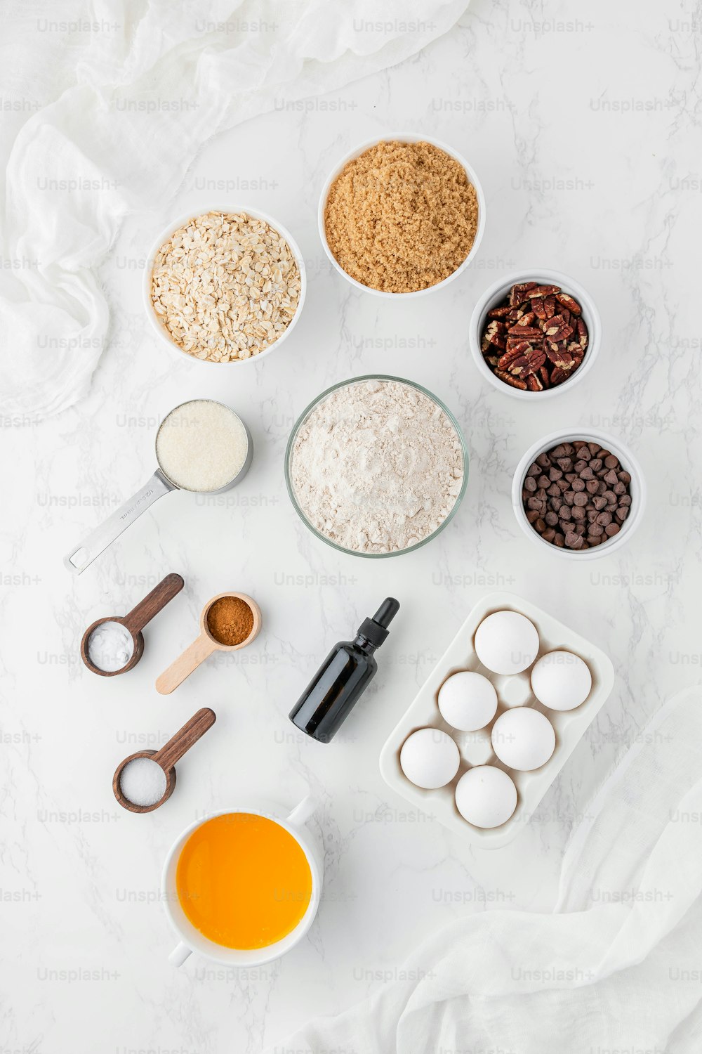 a table topped with bowls filled with different types of food