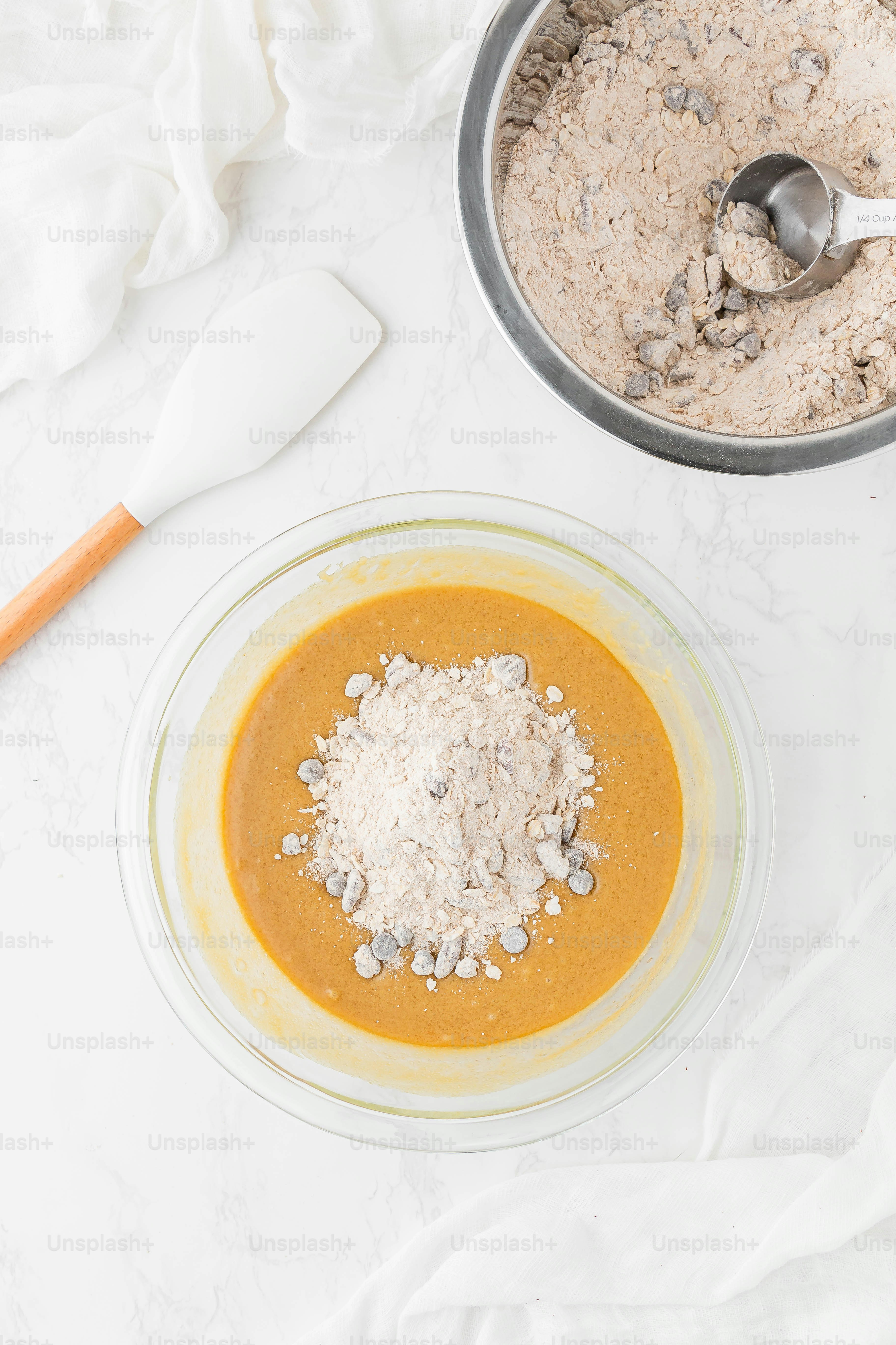 a bowl of food next to a bowl of oatmeal