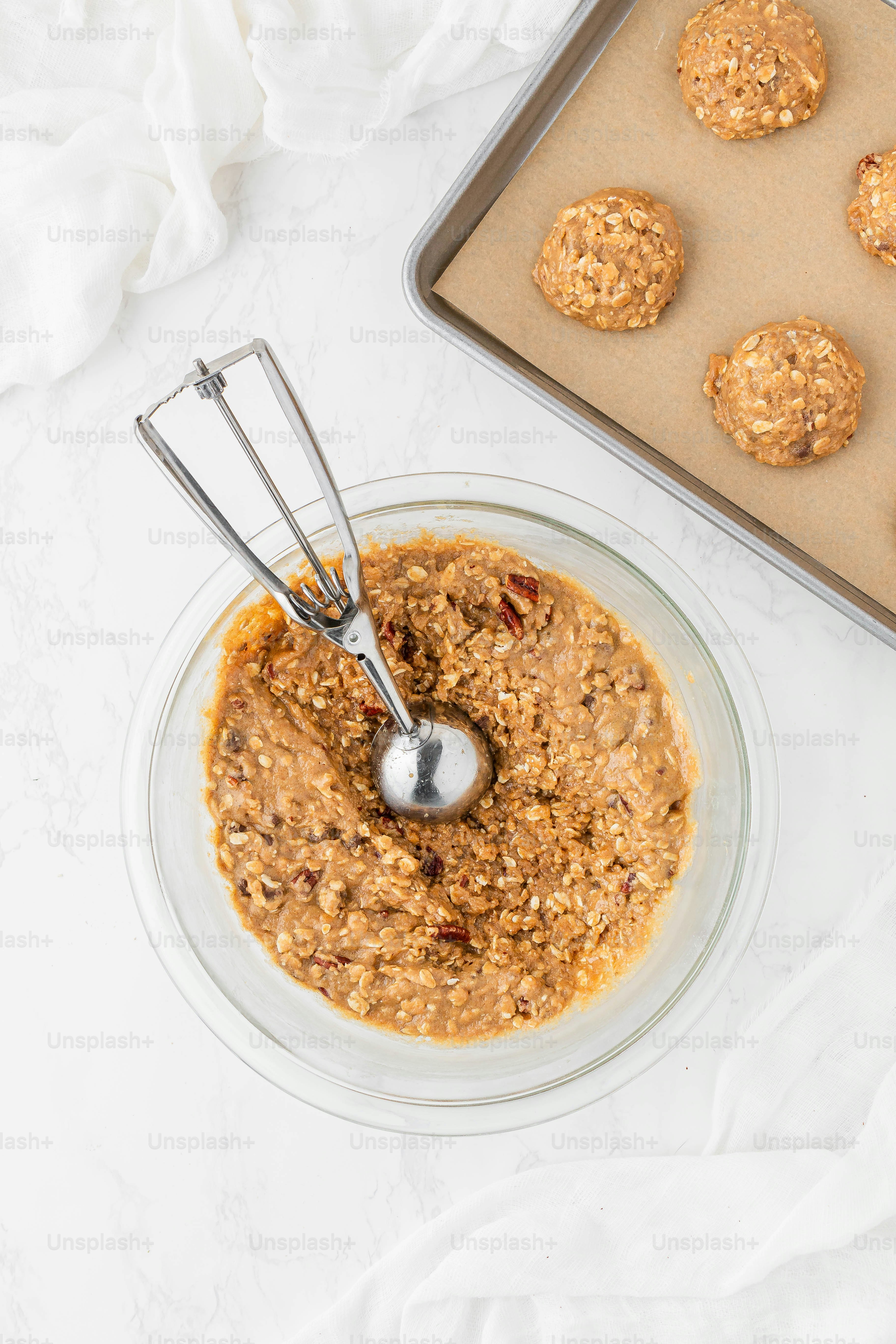 a bowl filled with oatmeal and a whisk