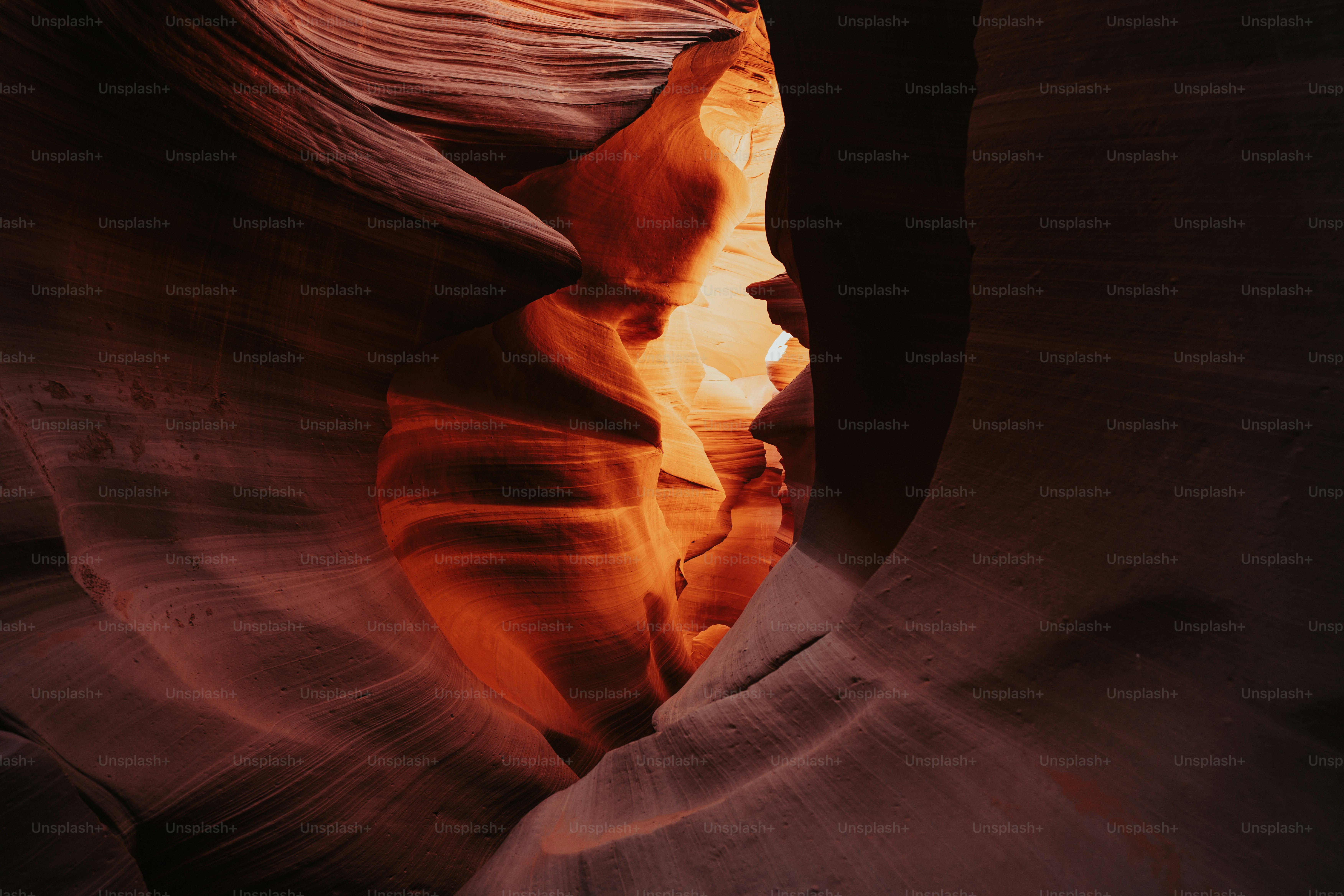 a narrow slot in the side of a canyon