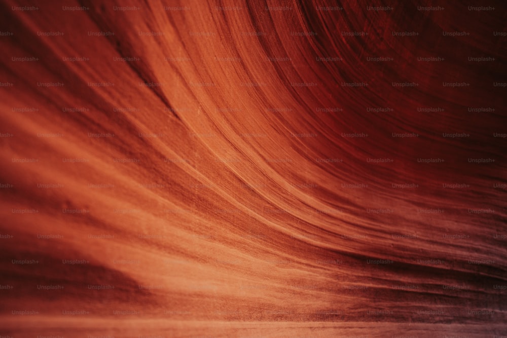 a close up of a red and orange wave