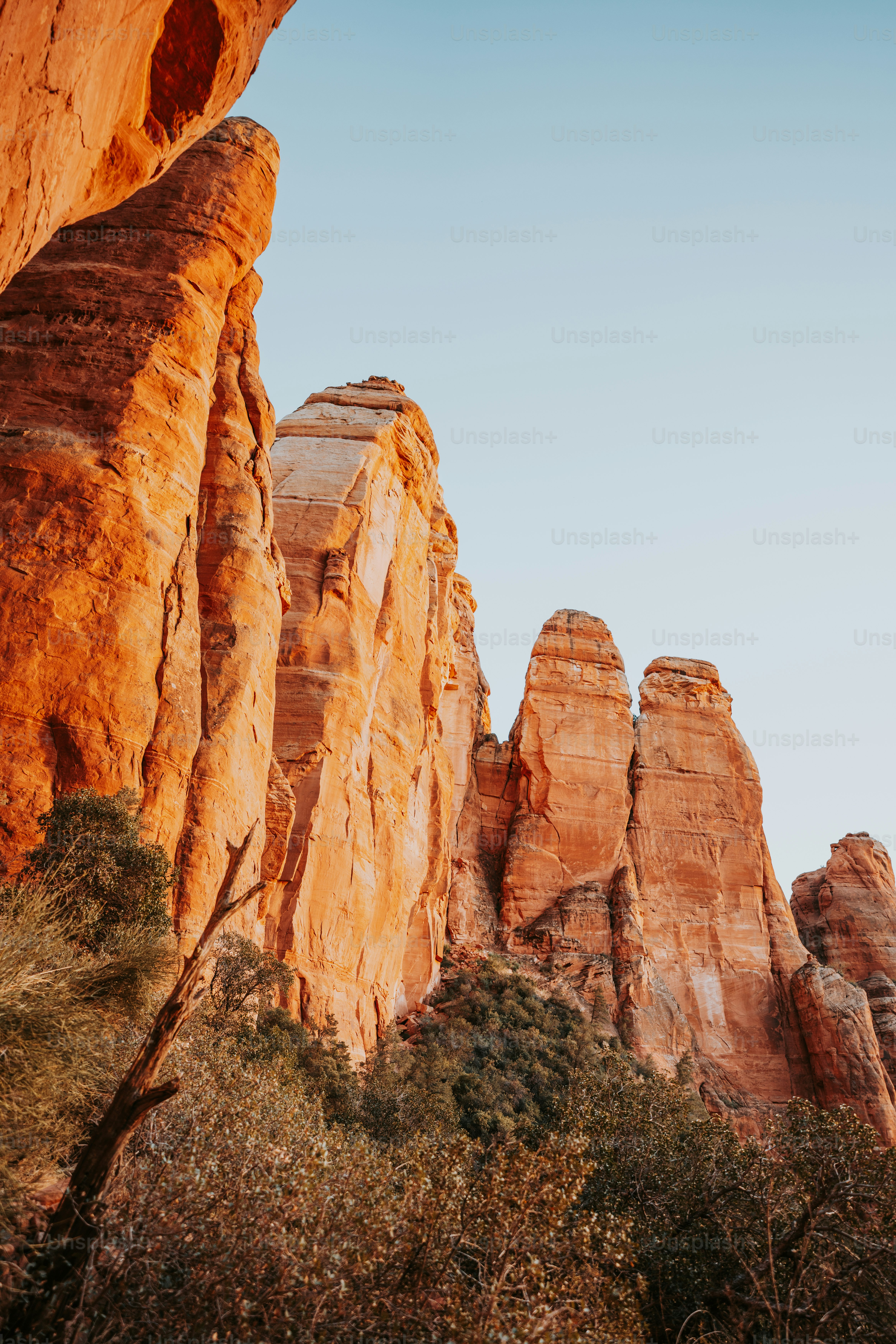 a large rock formation in the middle of a desert