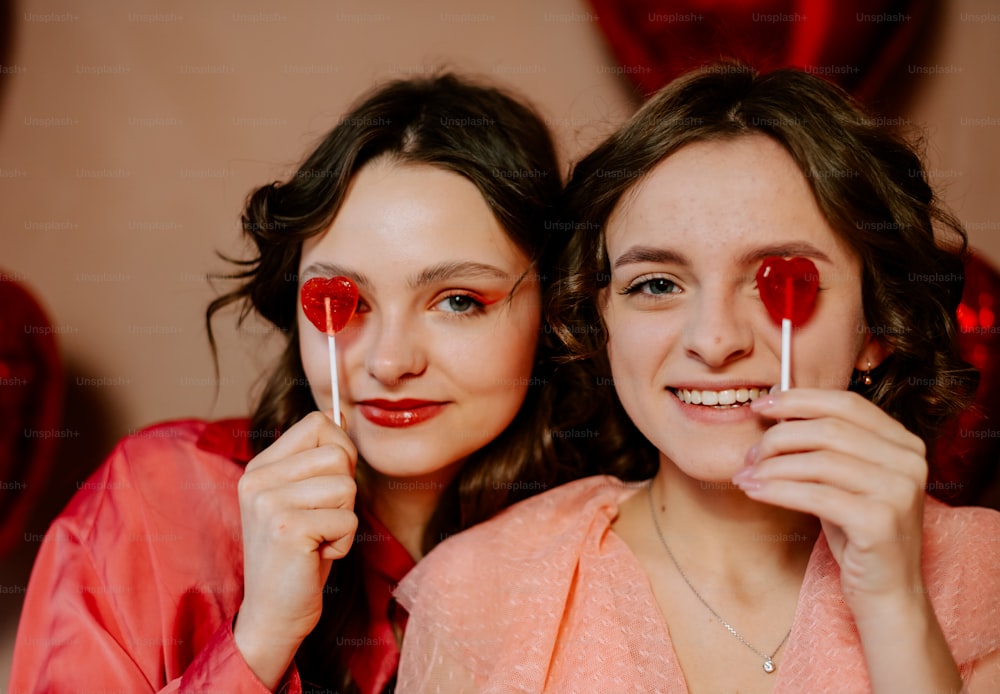 two women with fake blood on their faces