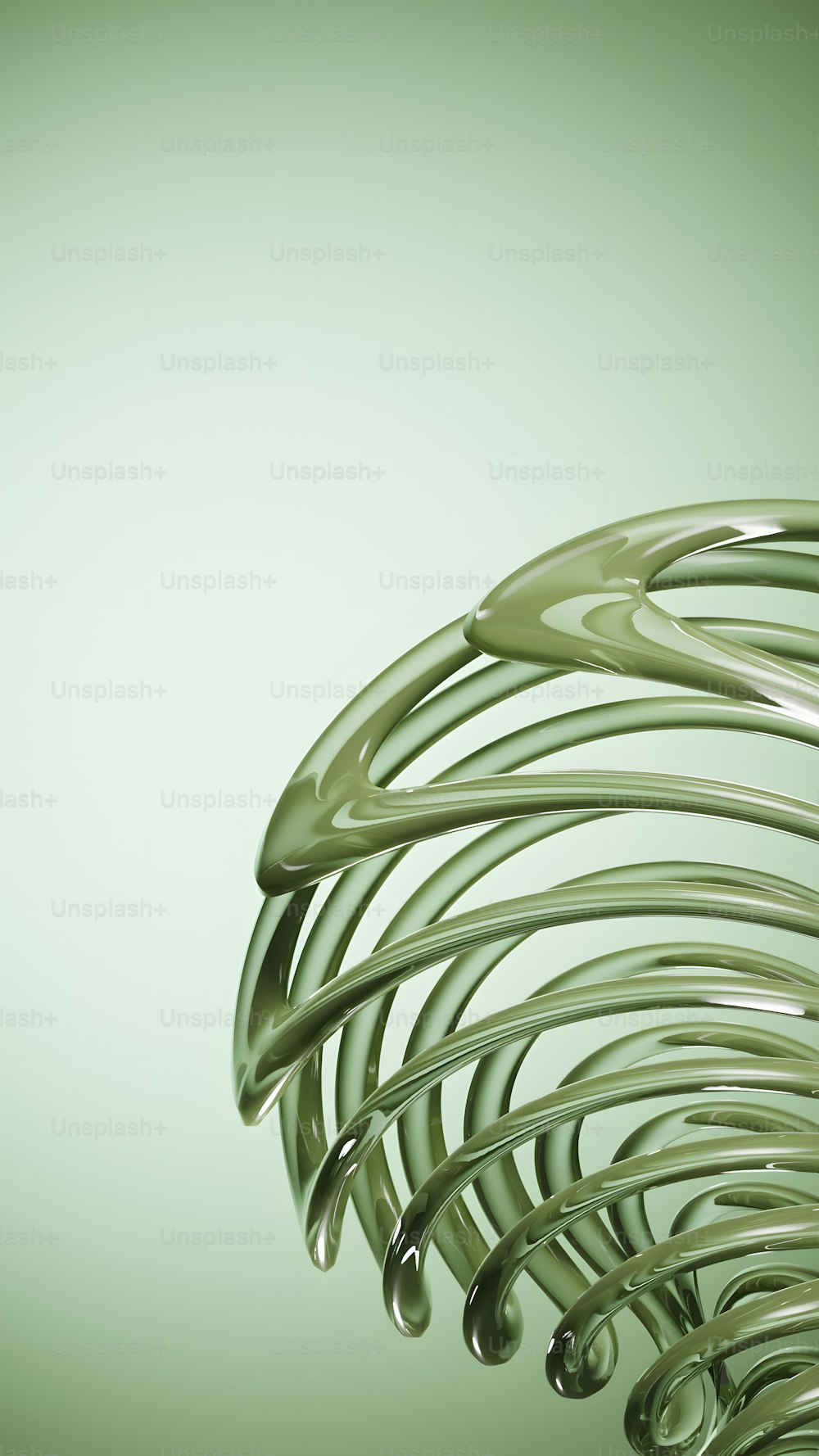 a close up of a metal object on a green background