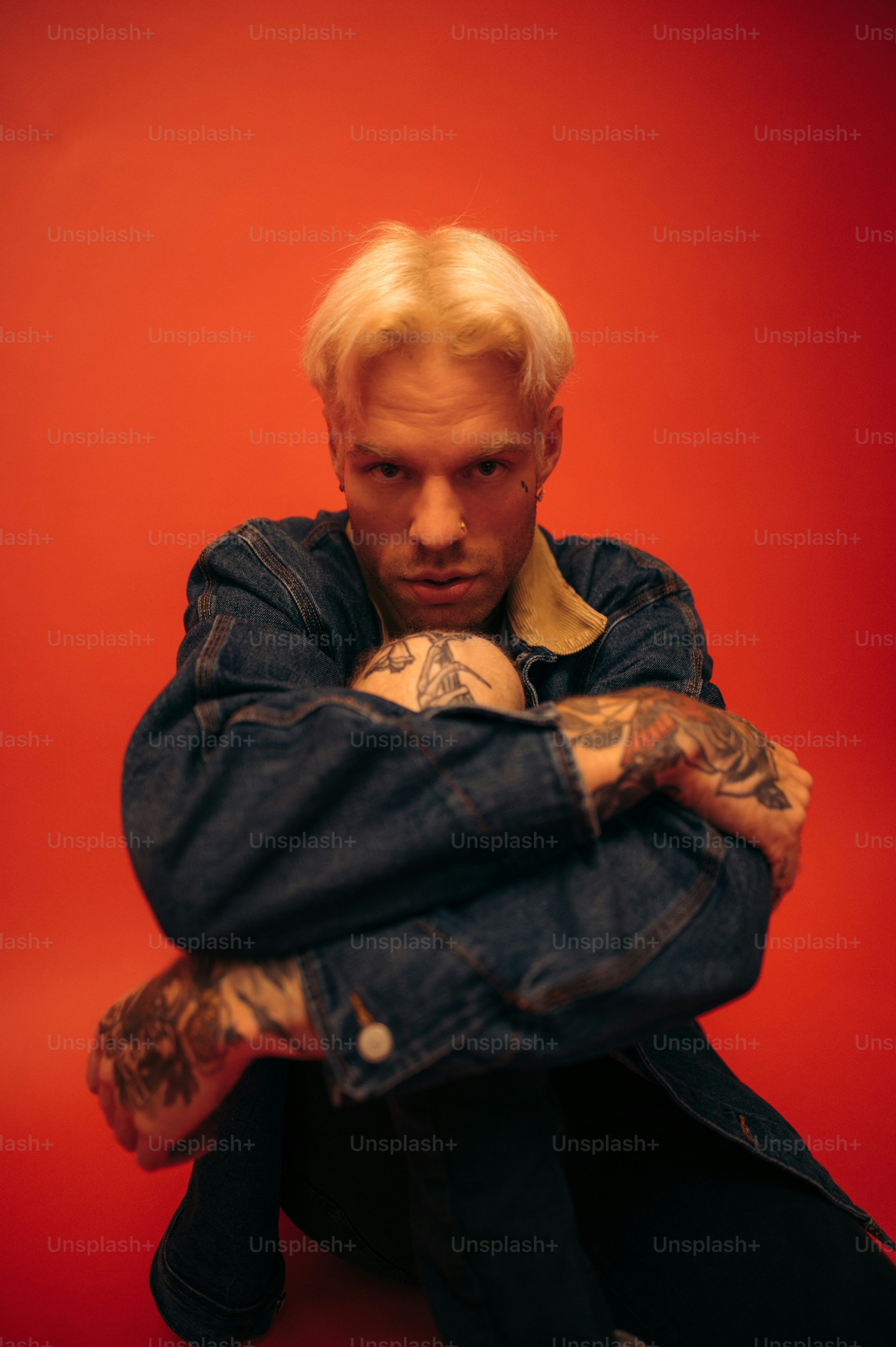 a man with a tattoo on his arm