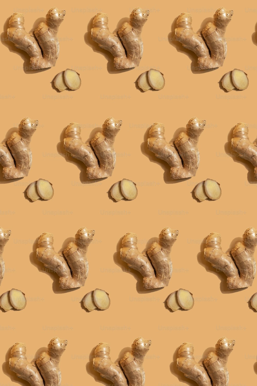 a pattern of nuts and a peanut on a beige background