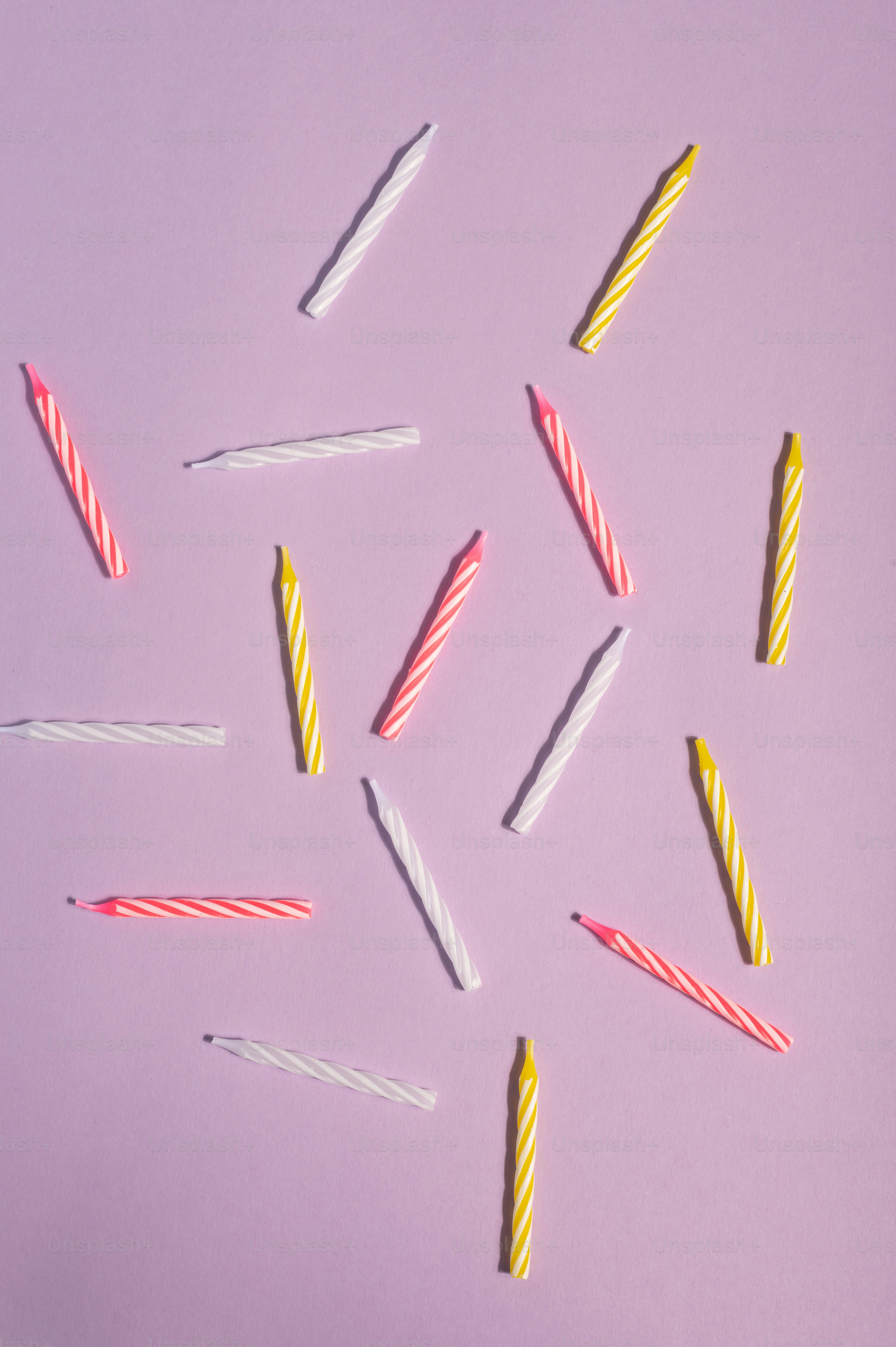 a bunch of candles that are on a table