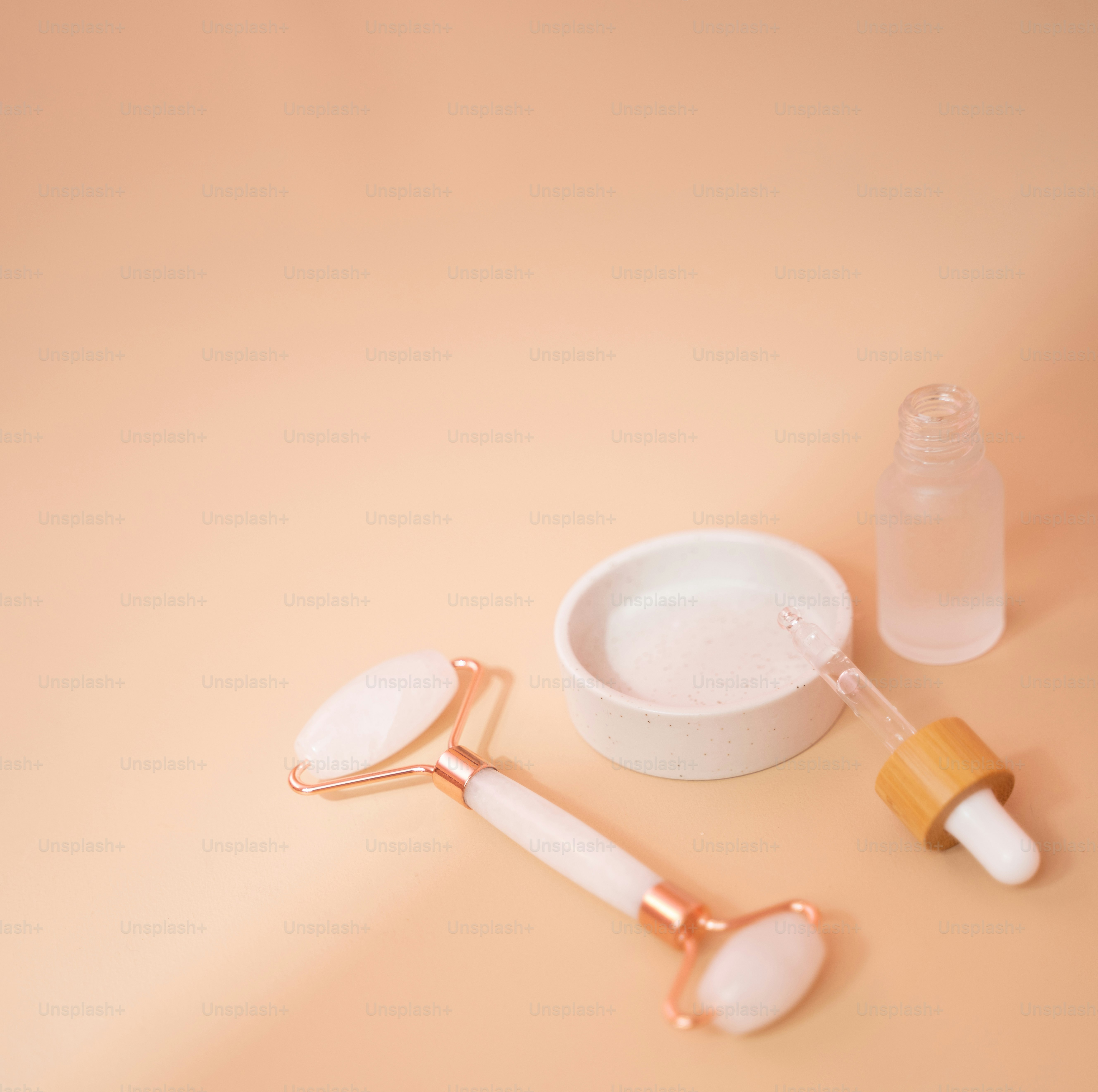 a bottle of lotion next to a container of lotion