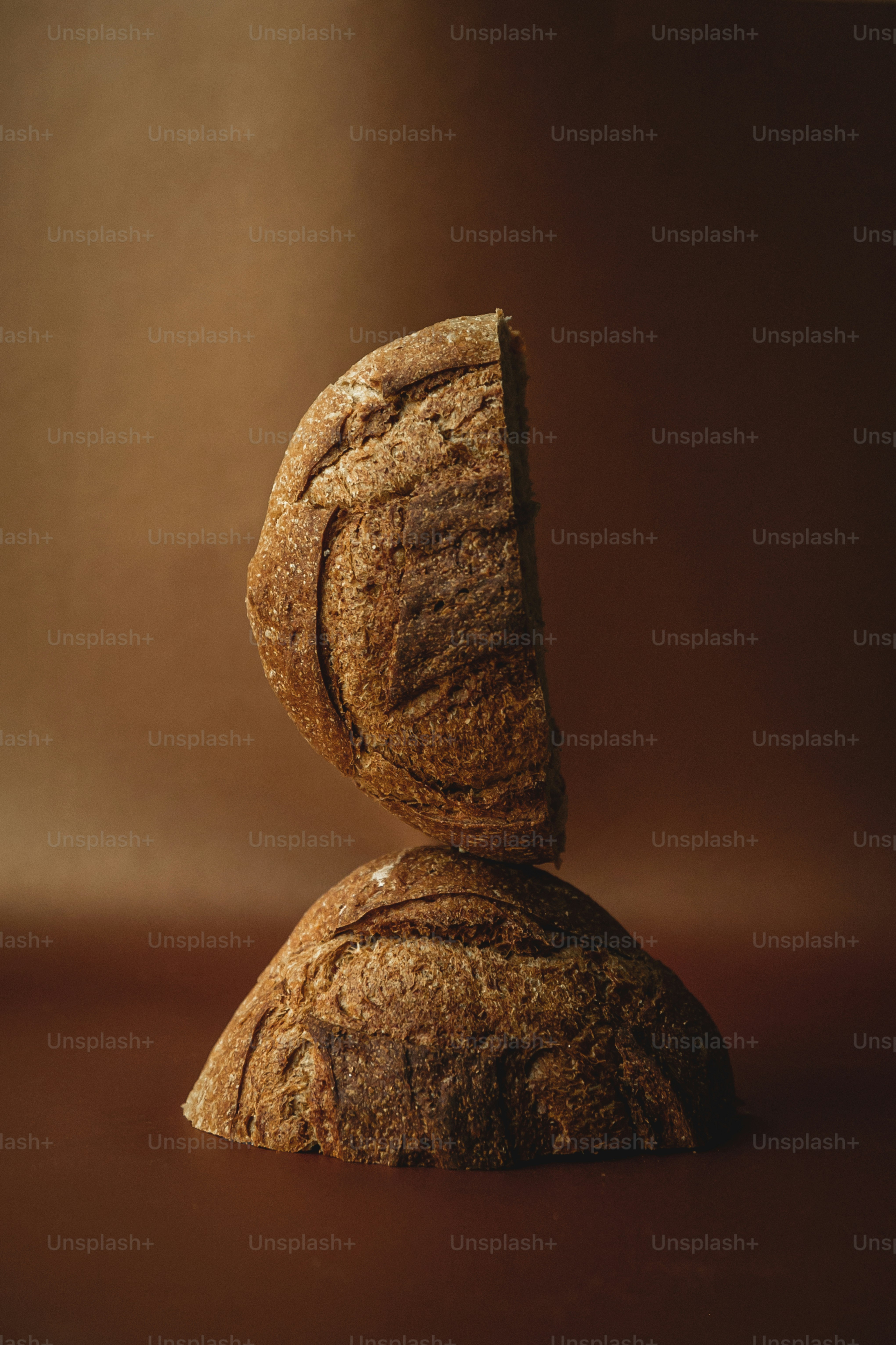 a piece of bread sitting on top of a rock