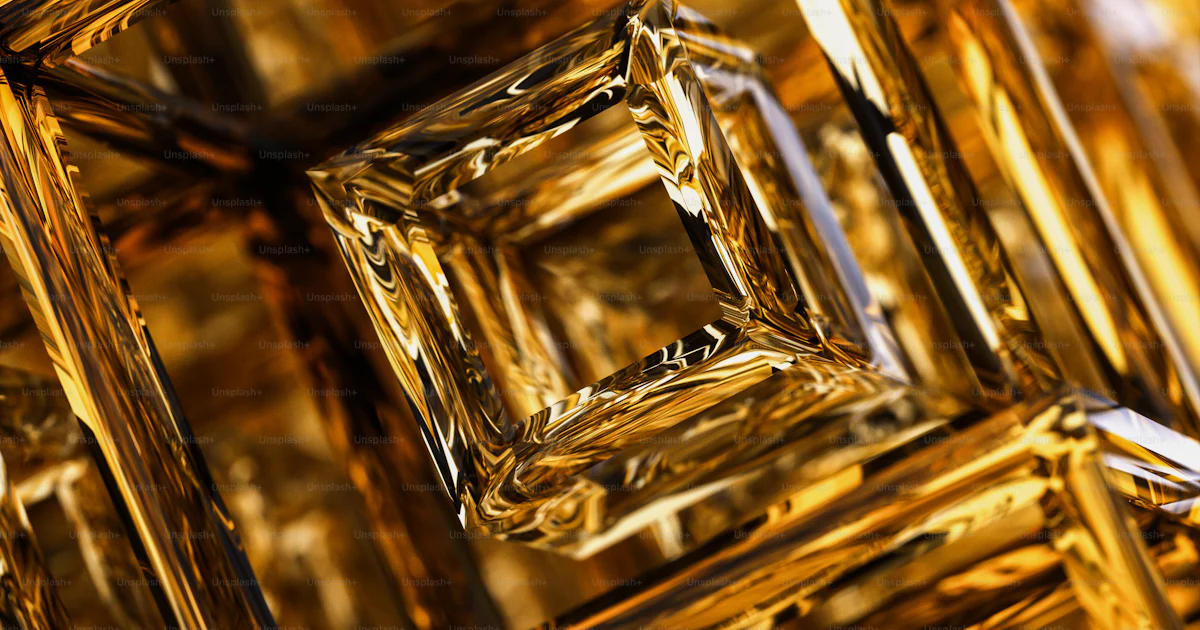 A close up of a bunch of gold squares photo – Refraction Image on Unsplash