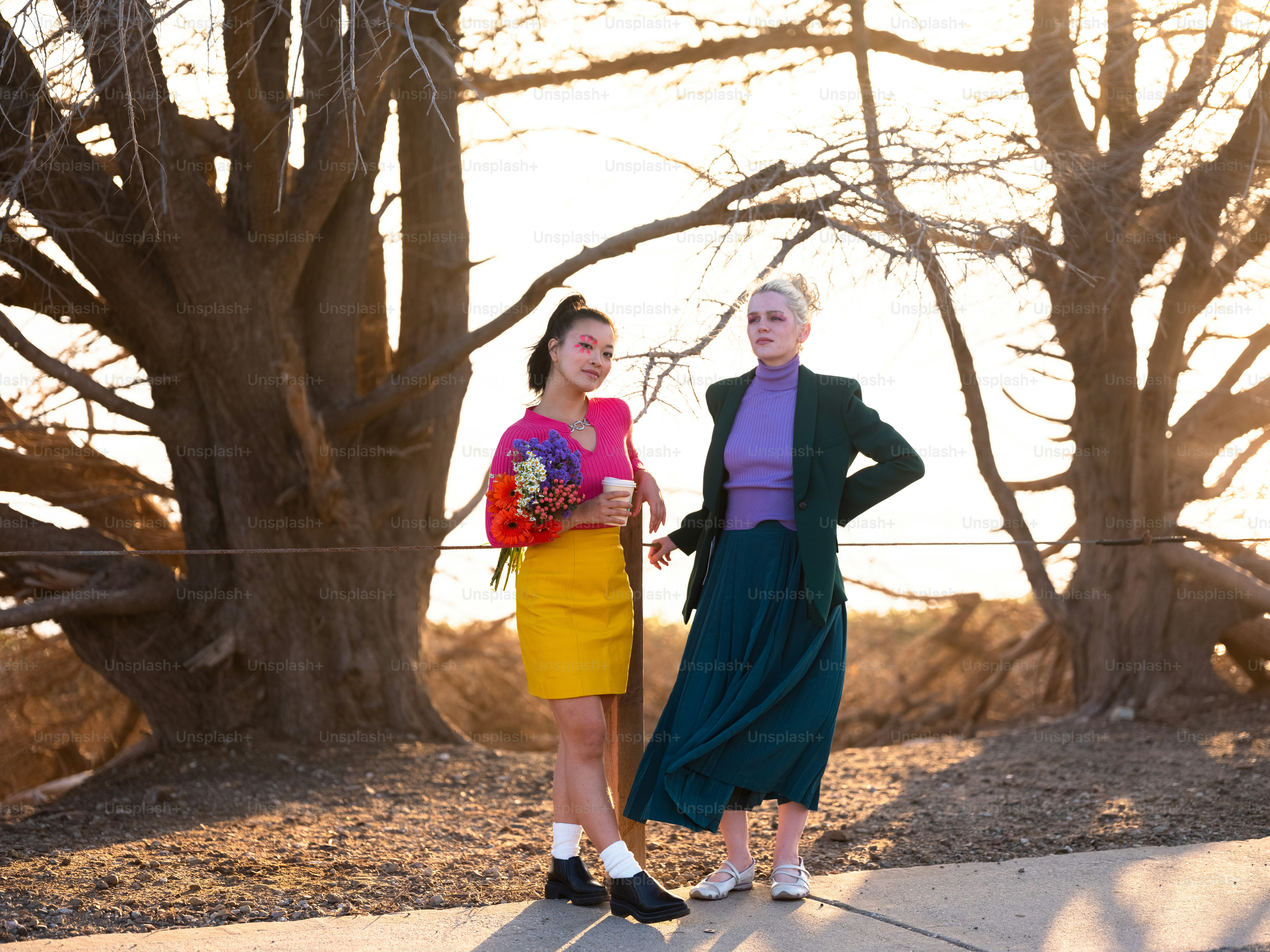 a couple of women standing next to each other