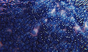 a close up of a bunch of blue bubbles