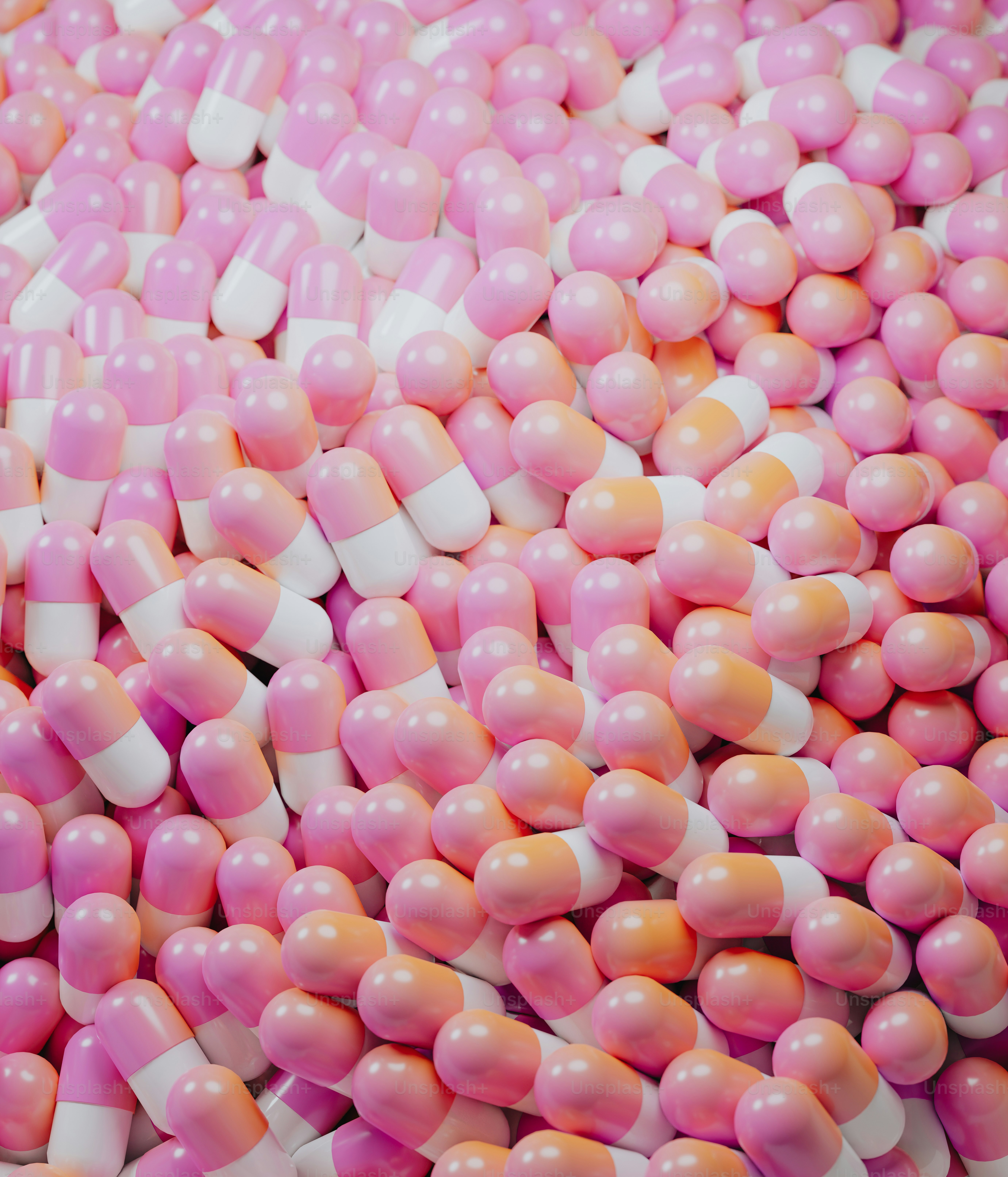 a pile of pink and white candy canes photo Medication Image on Unsplash