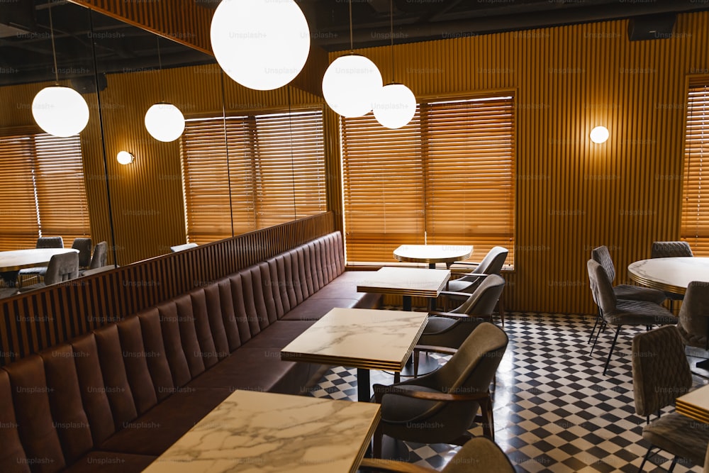 a restaurant with a checkered floor and wooden walls