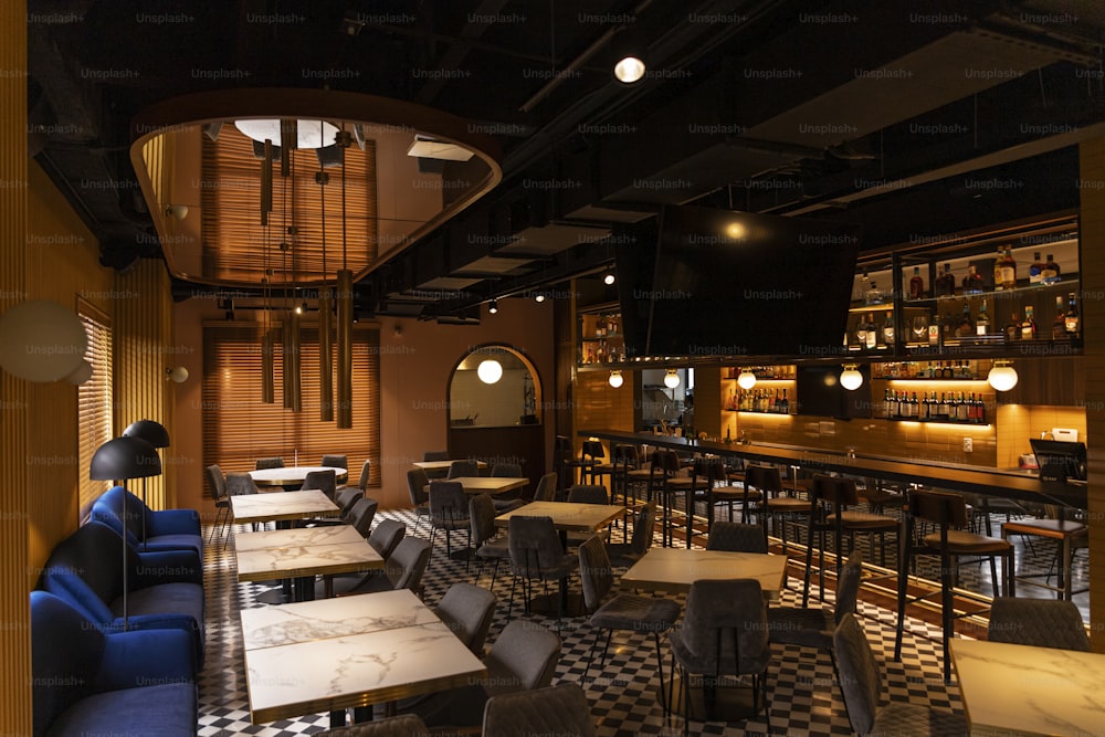 a restaurant with a checkered floor and tables