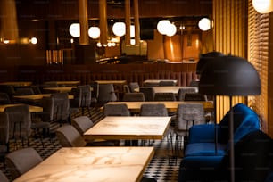 a restaurant with a checkered floor and tables and chairs