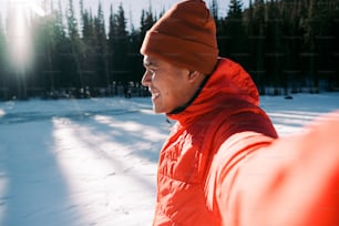a man wearing a red jacket and a red hat