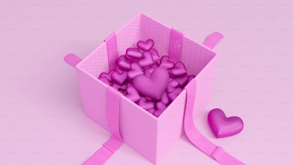 Una scatola rosa piena di tanti cuori rosa