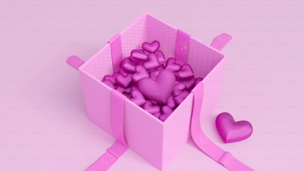 a pink box filled with lots of pink hearts