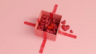 uma caixa rosa cheia de muitos corações vermelhos
