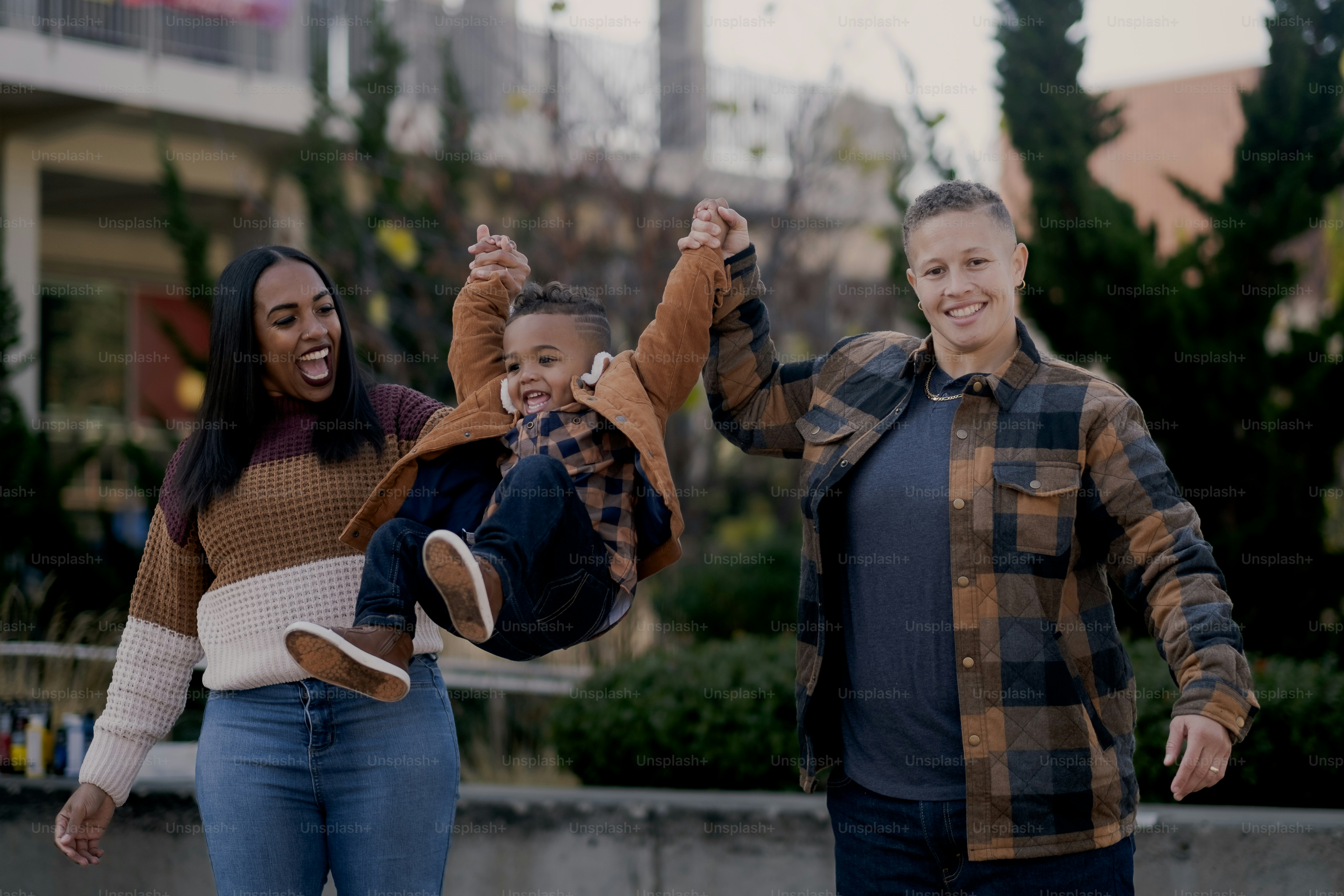 Ca. and Fr., proud mothers to their three year old child Ad., enjoy a family outing in California.