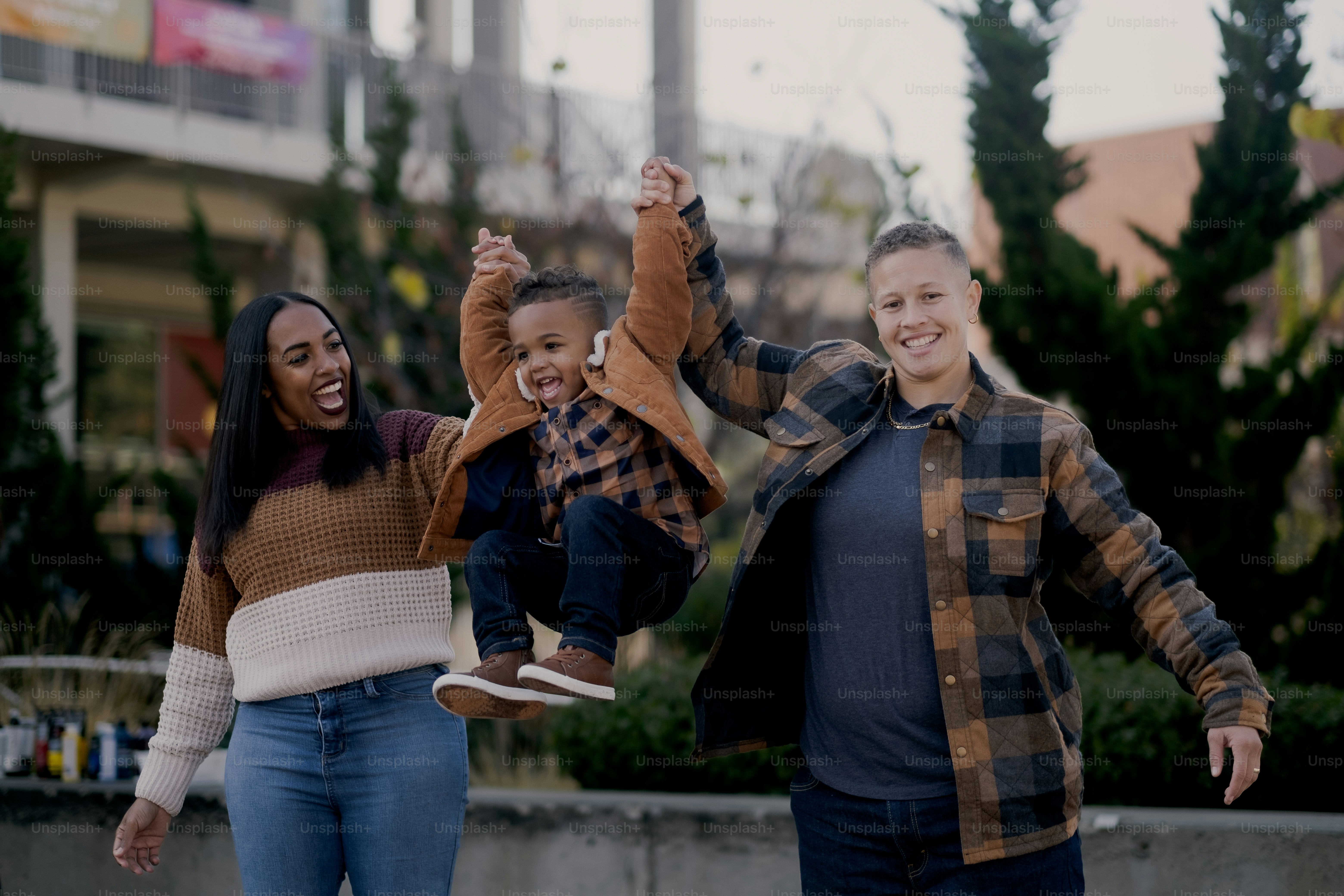 Ca. and Fr., proud mothers to their three year old child Ad., enjoy a family outing in California.