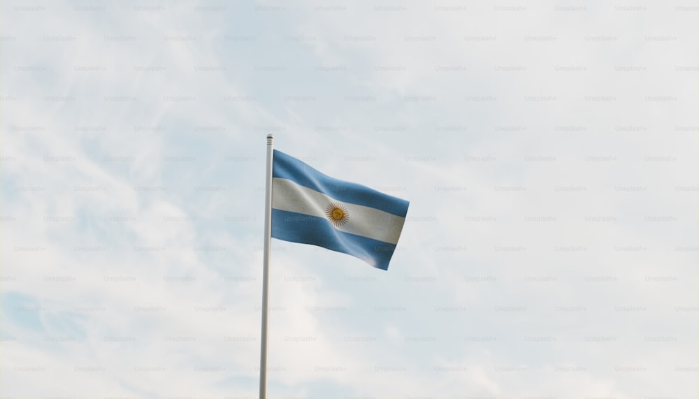 a flag flying in the wind on a cloudy day