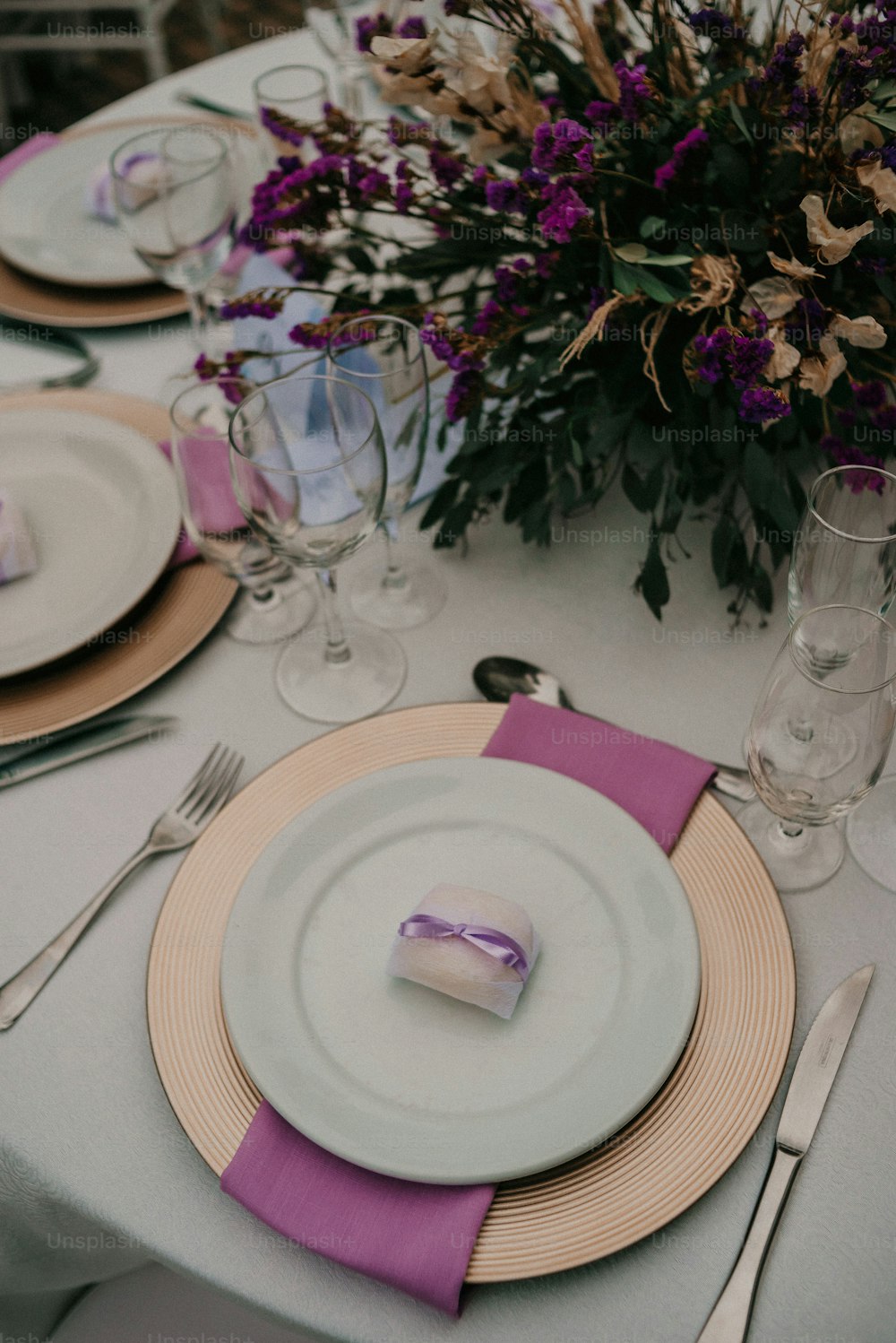 a table is set with plates and silverware
