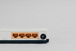 a close up of a router on a white surface