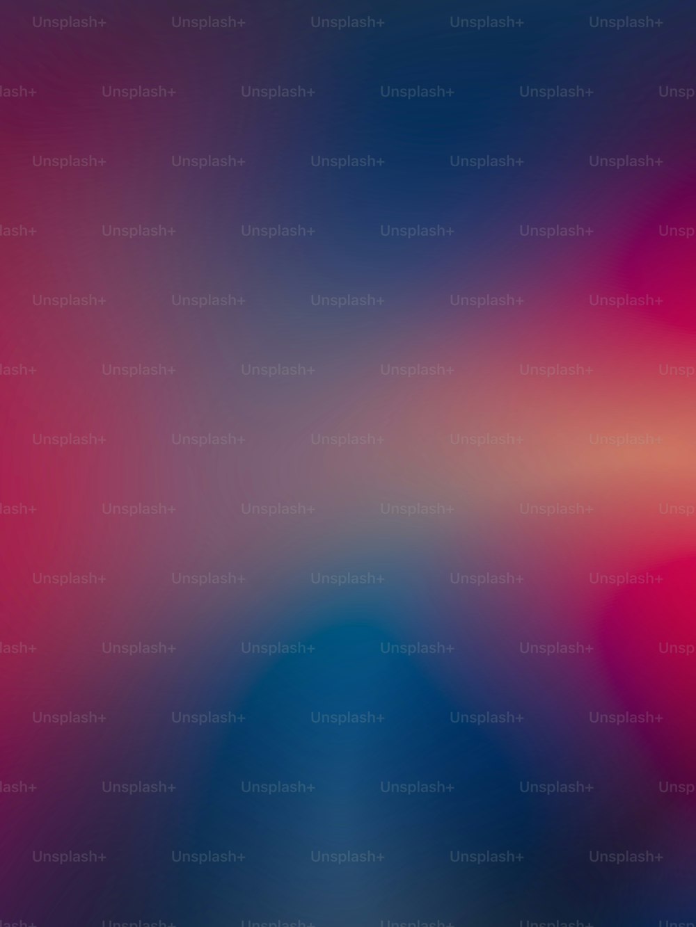 a blurry image of a red and blue background