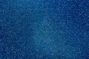 a dark blue background with small speckles