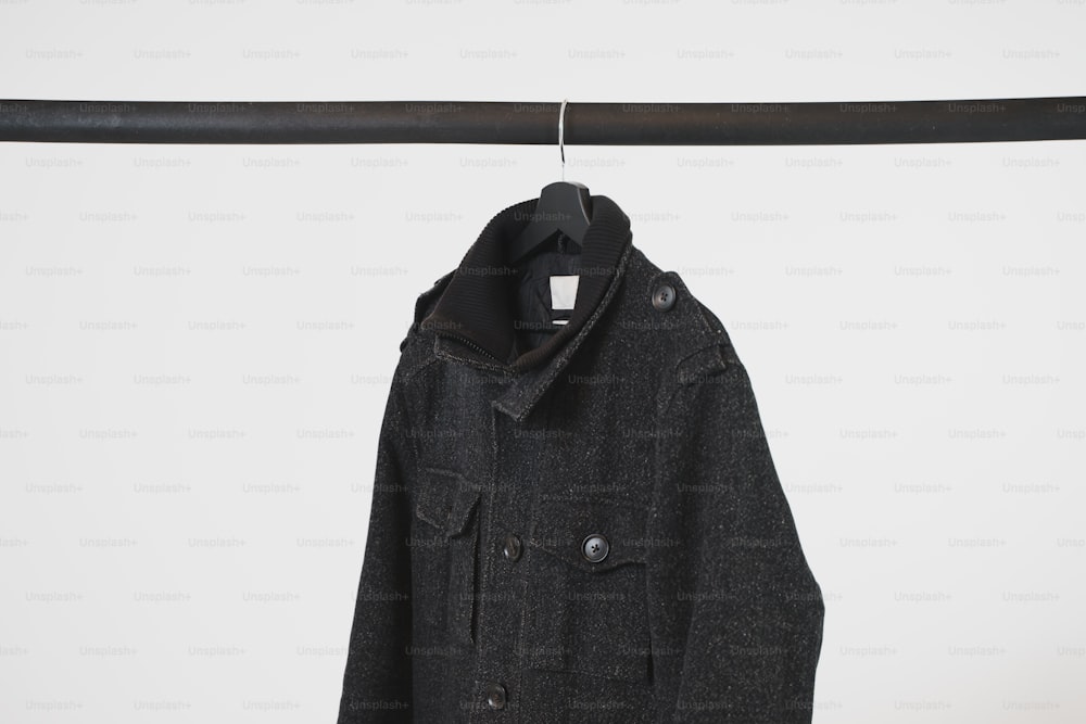 a coat hanging on a clothes line