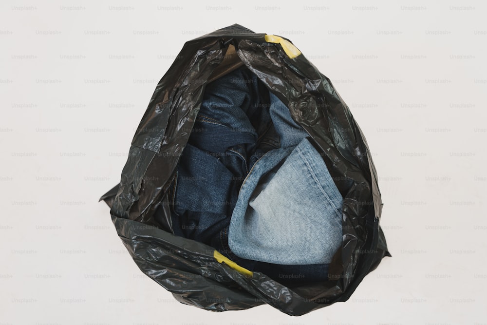a bag with a pair of jeans inside of it
