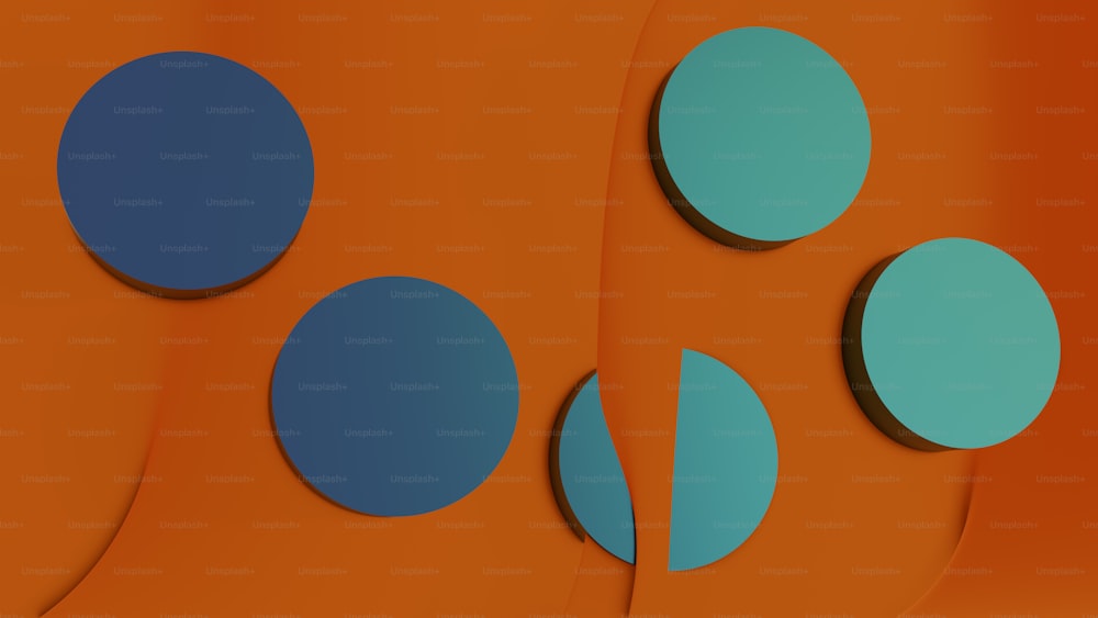 Un gruppo di cerchi blu seduti in cima a un muro arancione