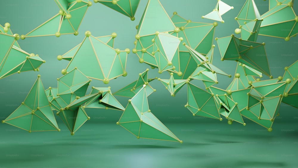 a group of green origami pieces floating in the air