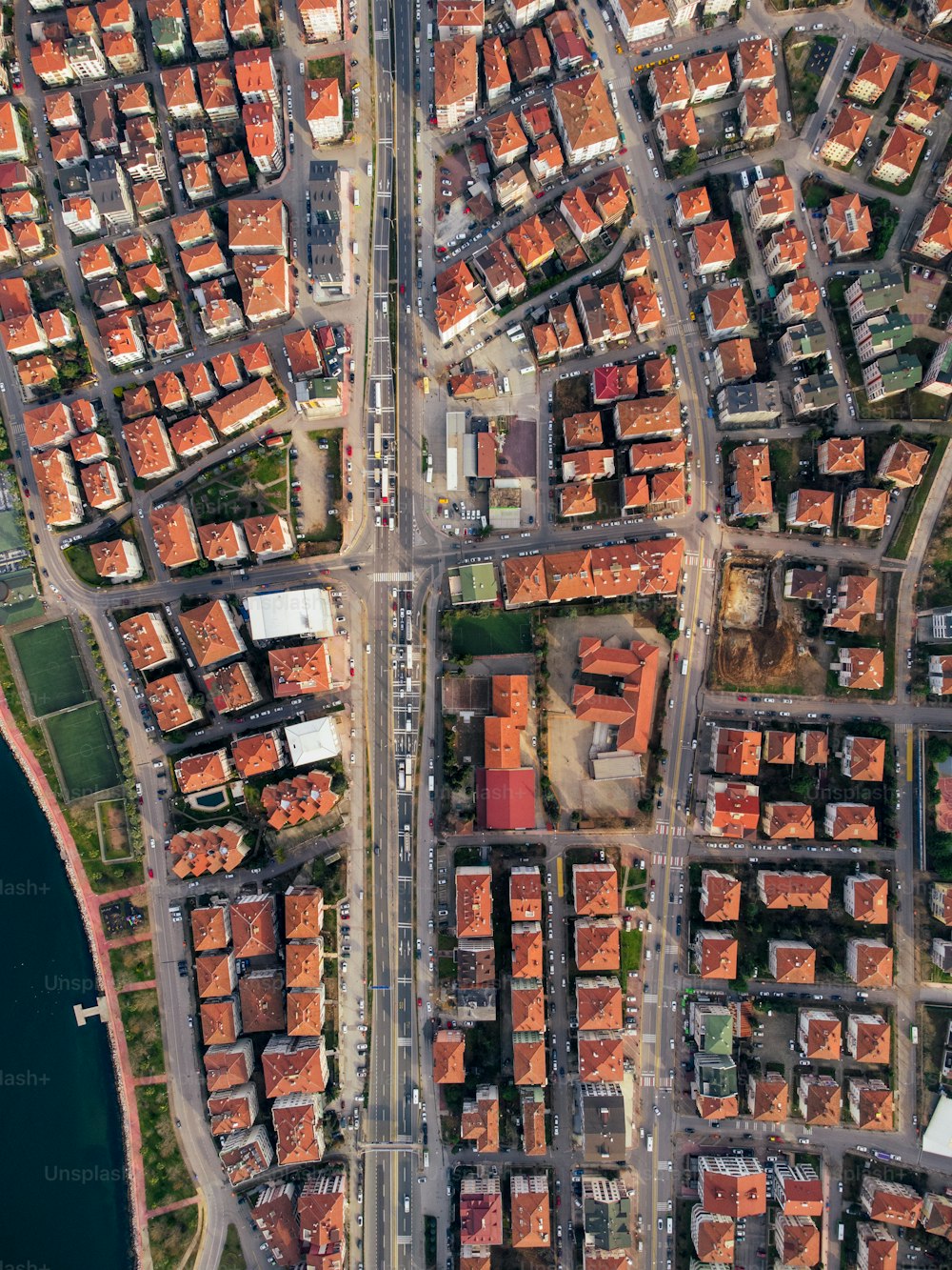 an aerial view of a city with lots of buildings