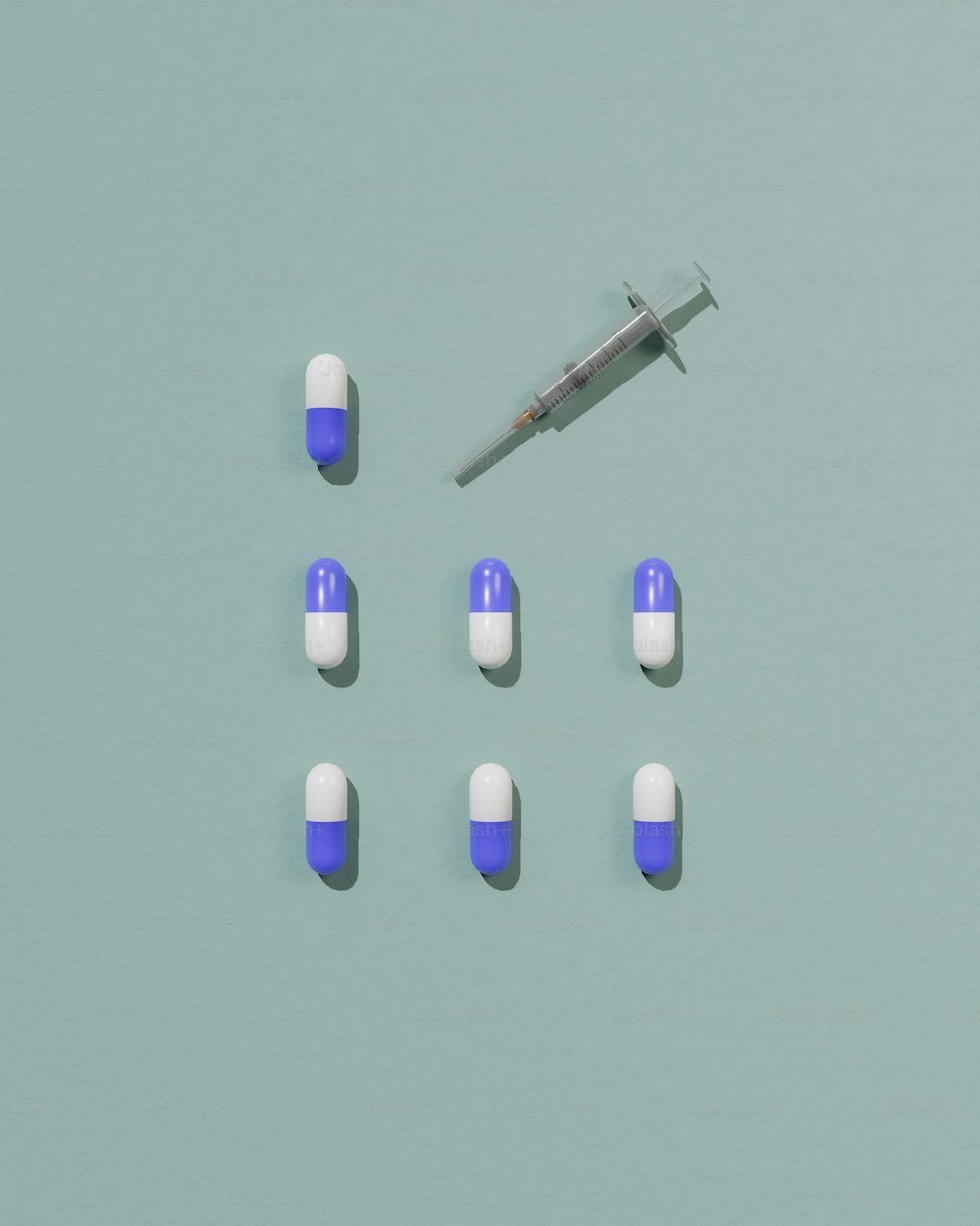 um grupo de pílulas azuis e brancas ao lado de um syquet