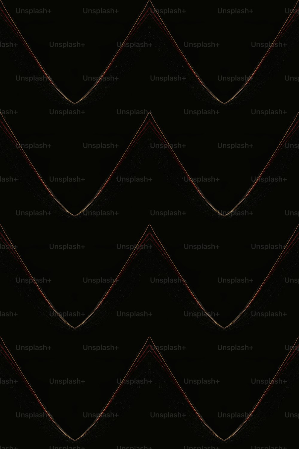 a black background with a red zigzag pattern