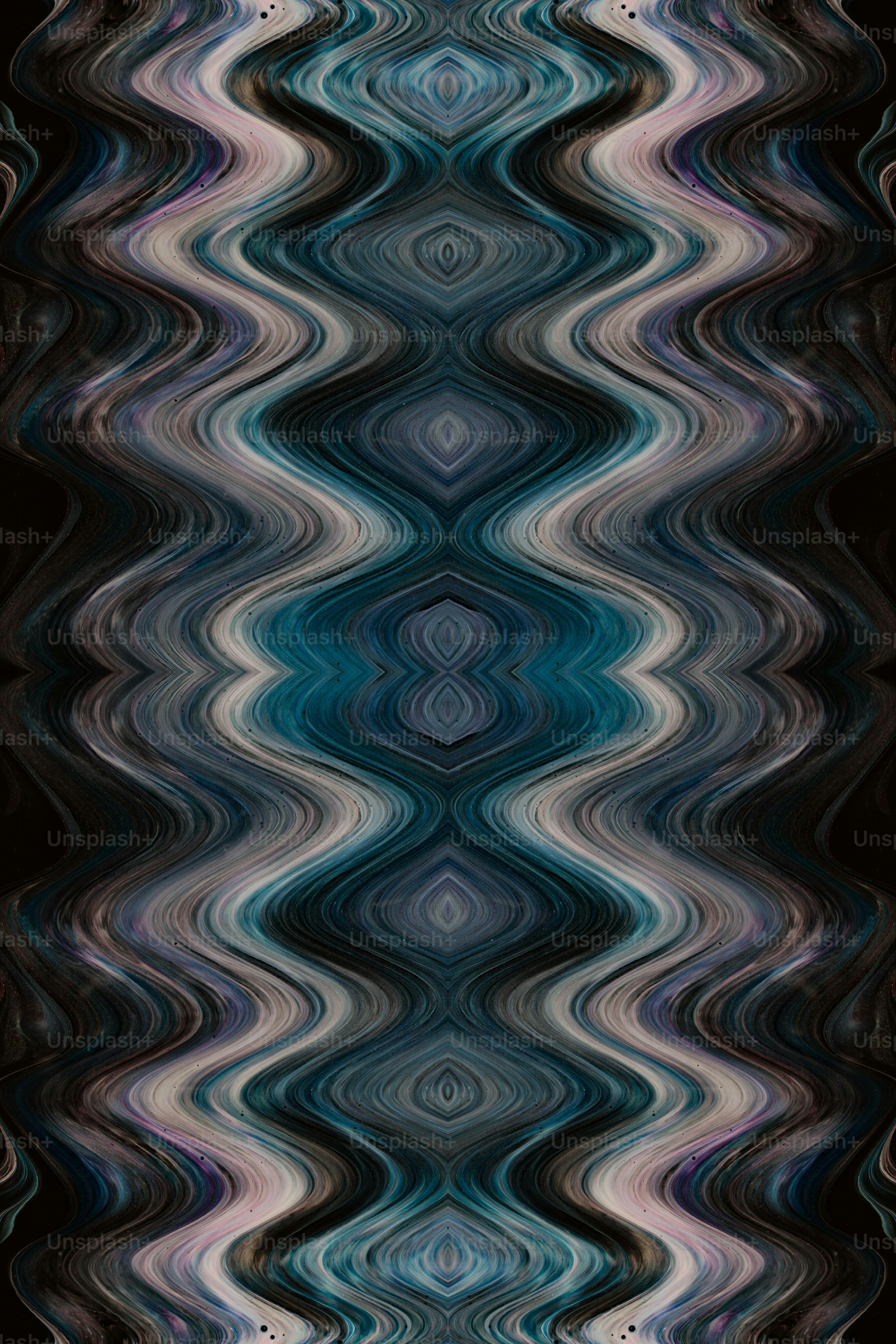 a black and white photo of a wavy pattern