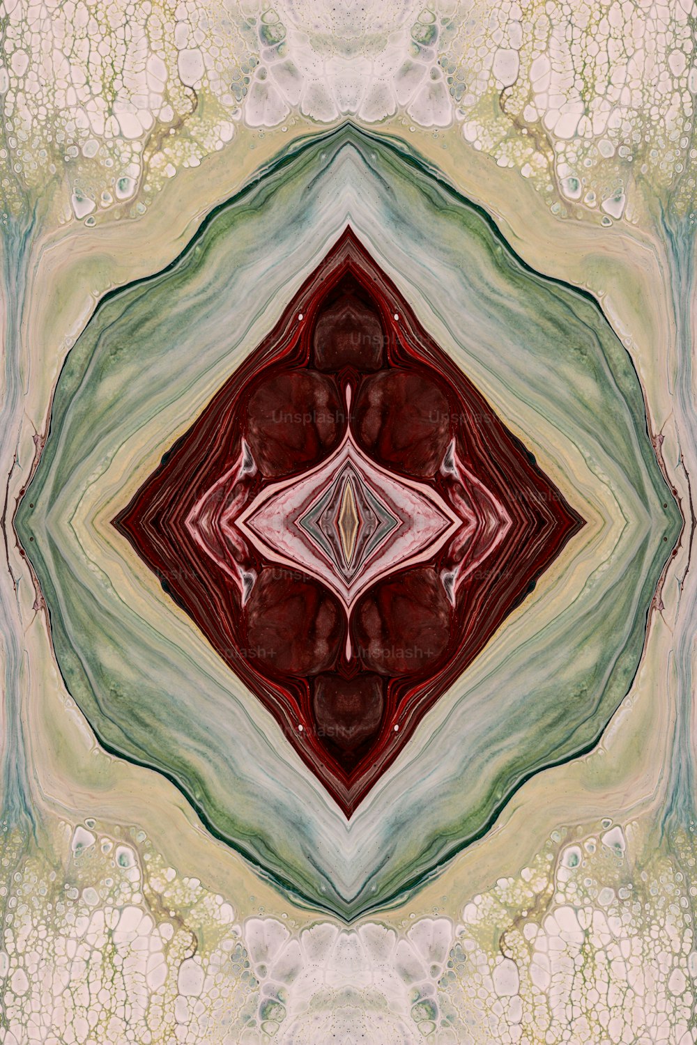 an abstract image of a red, white and green design
