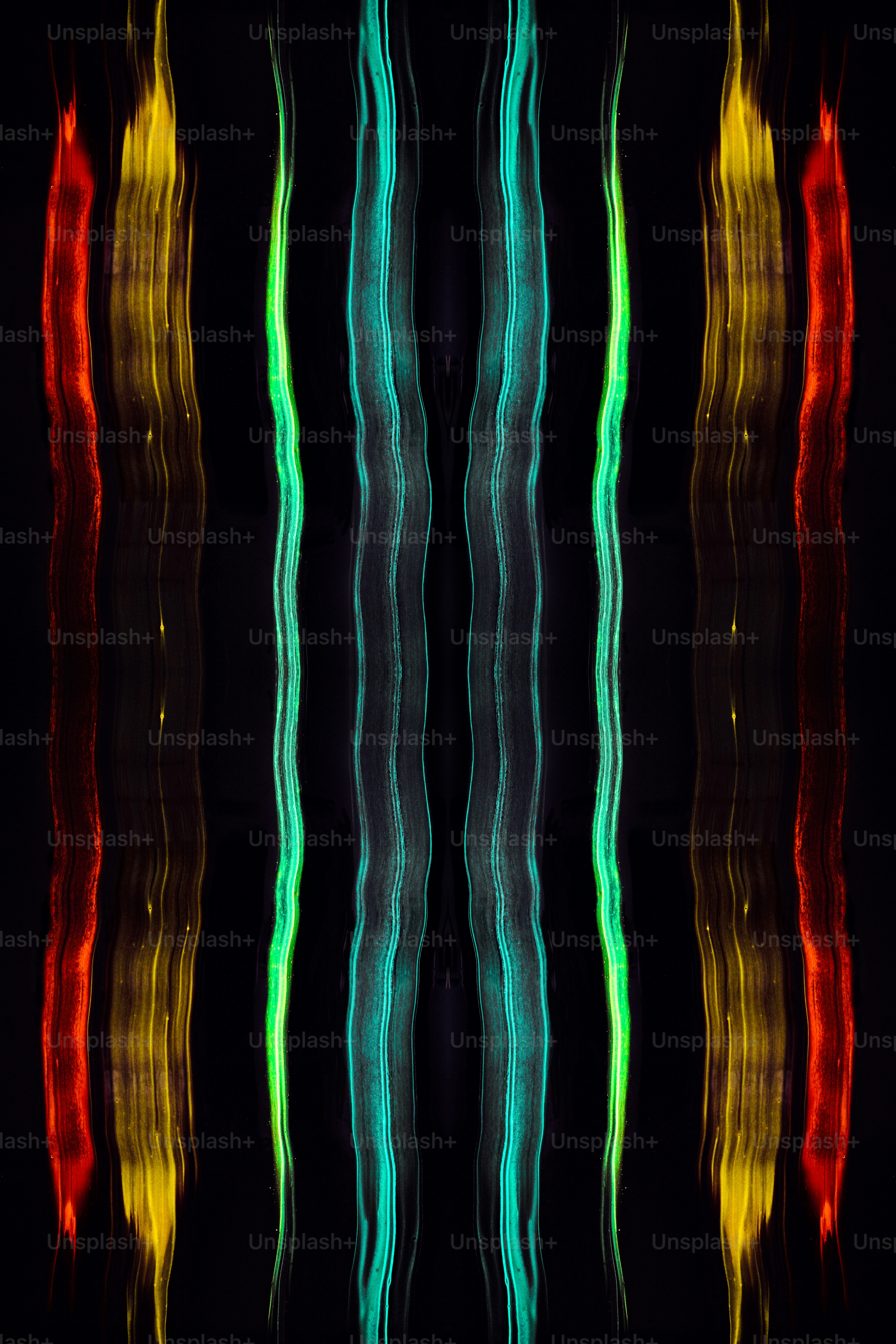 a black background with a multicolored image of wavy lines