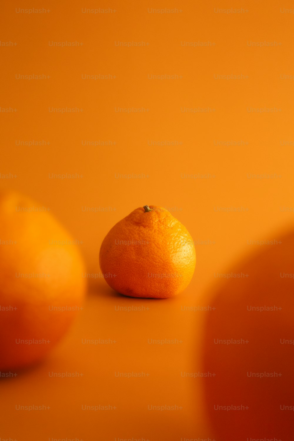a close up of an orange on a table