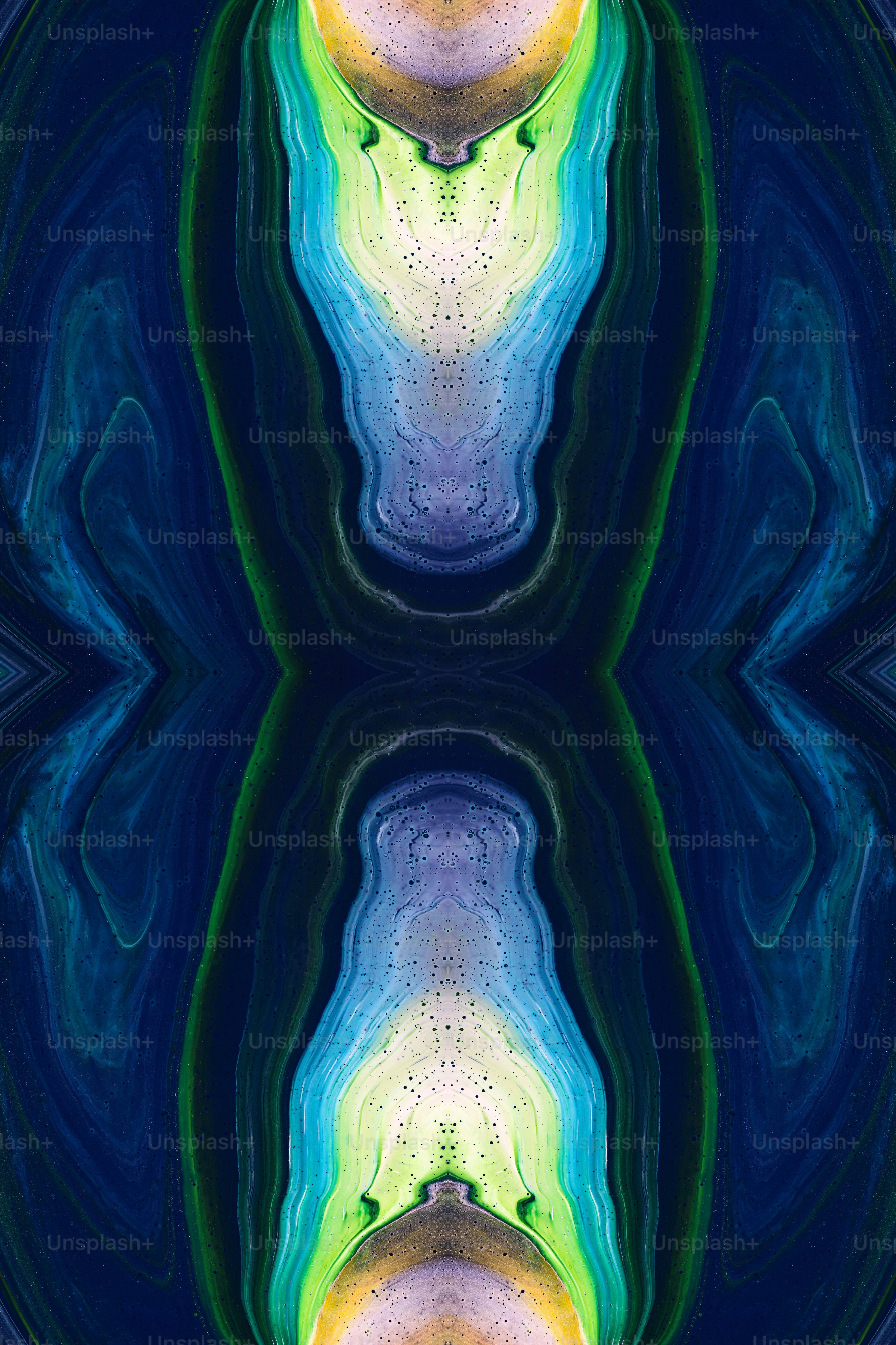 une image abstraite d’un motif bleu, jaune et vert